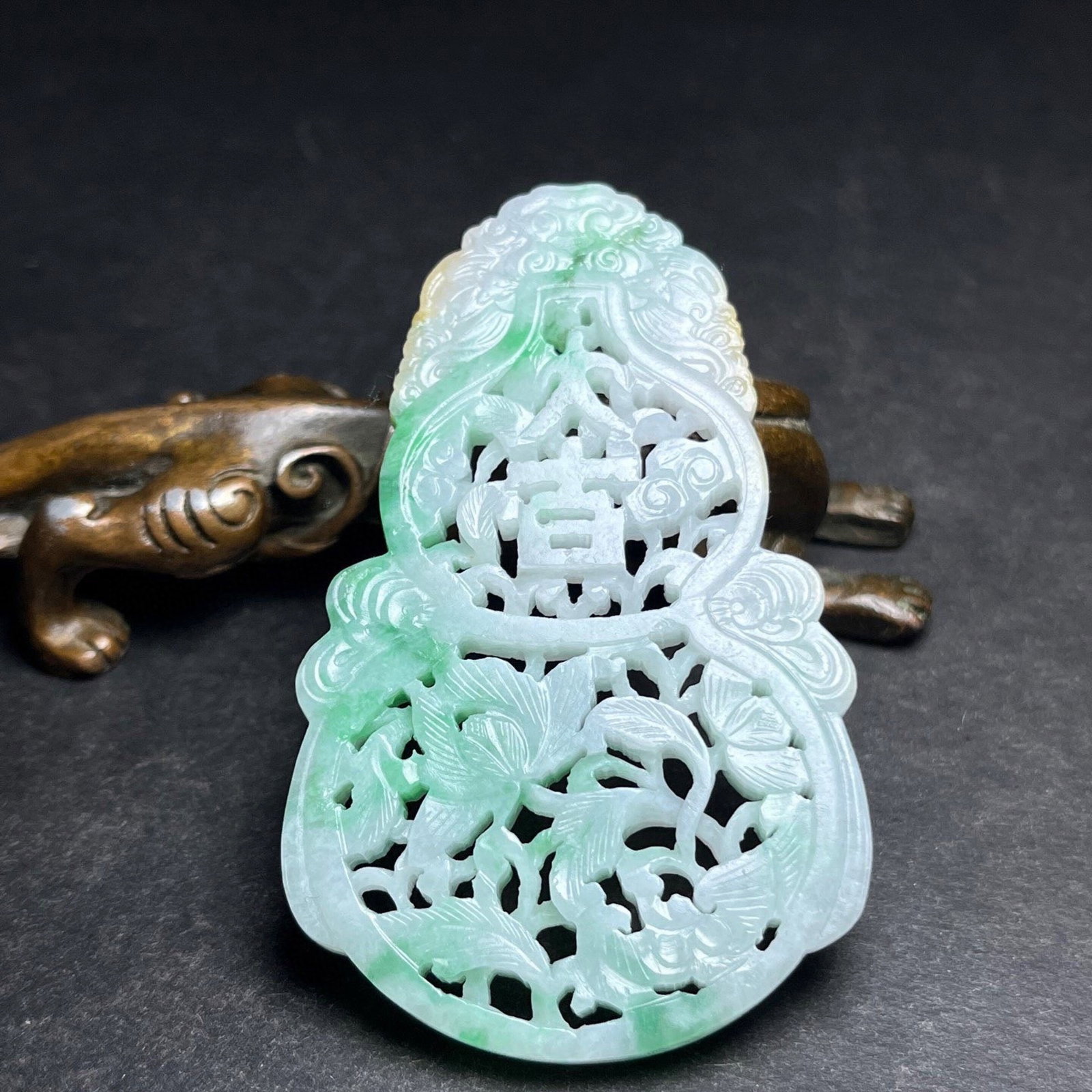 An Exquisite Jadeite Lotus Pattern Gourd Pendant: An Exquisite Jadeite Lotus Pattern Gourd Pendant,Qing Dynasty,China,Size:75mmx5mmx46mm,Weight:32g