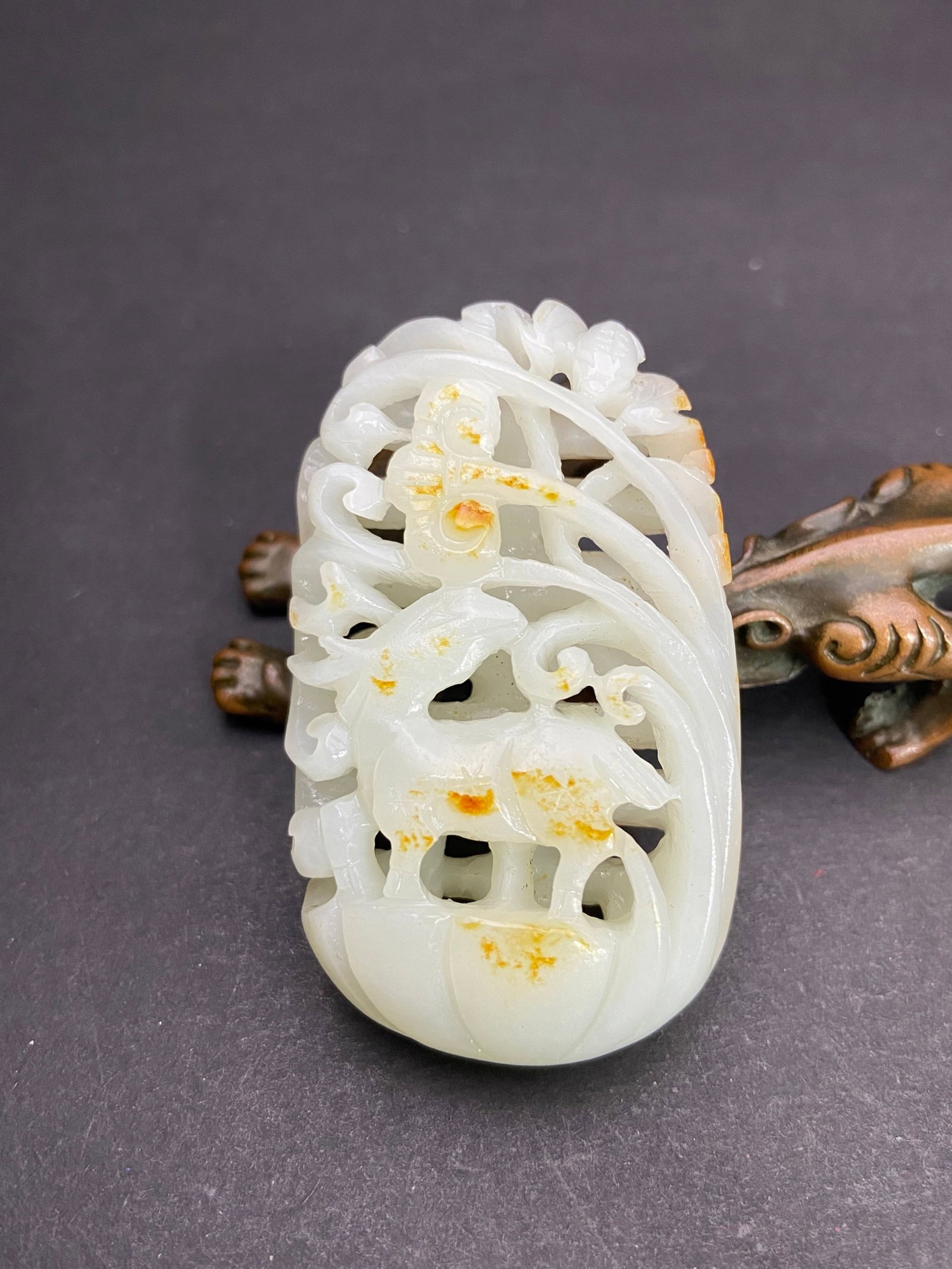 An Exquisite White Jade Hollow Deer Pattern Pendant: An Exquisite White Jade Hollow Deer Pattern Pendant,Qing Dynasty,China,Size:61mmx36mmx17mm,Weight:38g 白玉镂空鹿纹挂件,中国清代