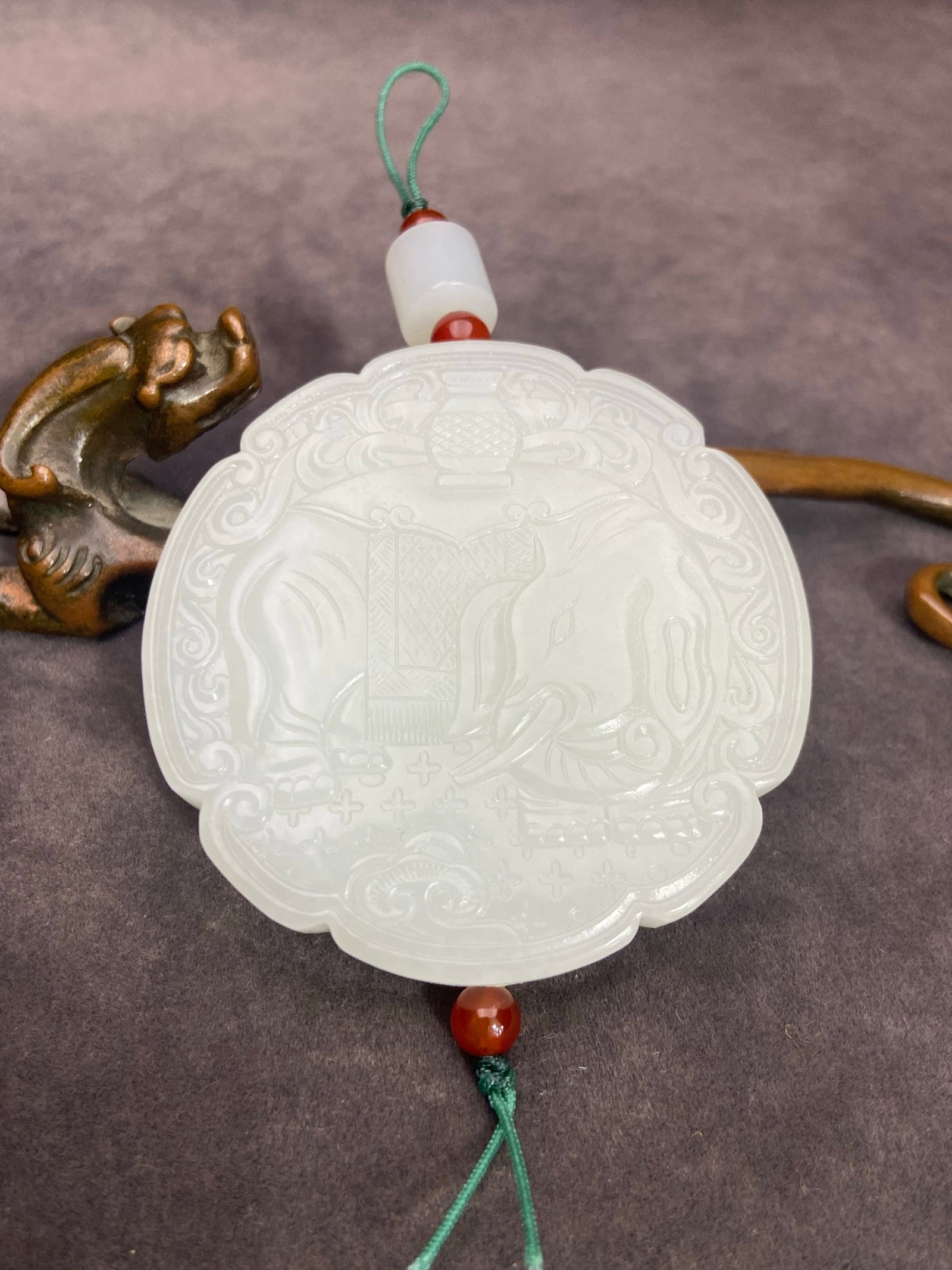 An Exquisite White Jade Elephant Pattern Pendant (1 of 7)