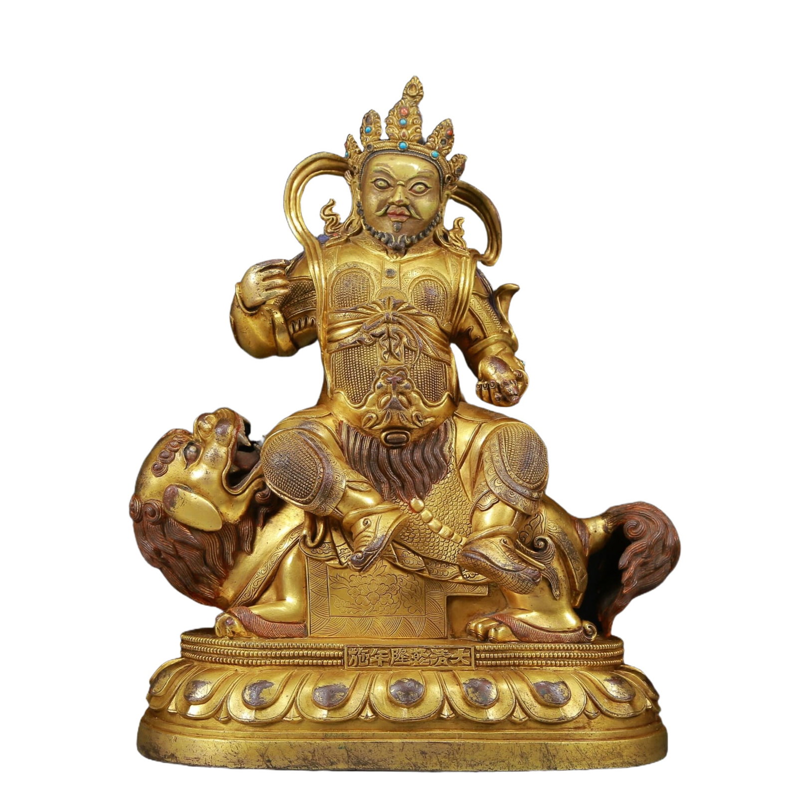 A solemn gilt bronze statue of the King of Treasures: A solemn gilt bronze treasure statue of the Mammon, Qianlong six-character mark, Qing Dynasty, China. This is a breathtaking Buddhist work of art. The face of the Buddha statue is solemn and kind,