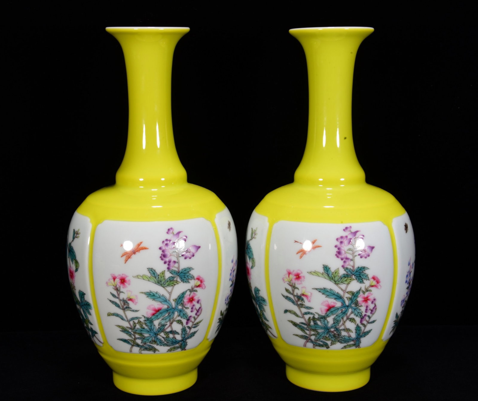 A Pair of Exquisite Yellow Glazed Famille-Rose Flower and Butterfly Pattern Vases: A Pair of Exquisite Yellow Glazed Famille-Rose Flower and Butterfly Pattern Vases,Qing Dynasty, China,Qianlong Six-character Mark,Size:8.7inx3.9in 一对黄釉粉彩Ŏ