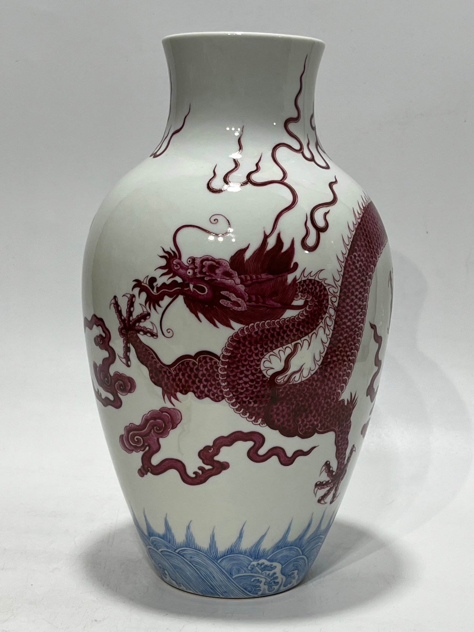 A Rare Blue and White Underglaze-Red Seawater,Auspicious Cloud and Dragon Pattern Vase: A Rare Blue and White Underglaze-Red Seawater,Auspicious Cloud and Dragon Pattern Vase,Qing Dynasty,China,Yongzheng Four-character Mark,Size:12.5in 青花釉里红海