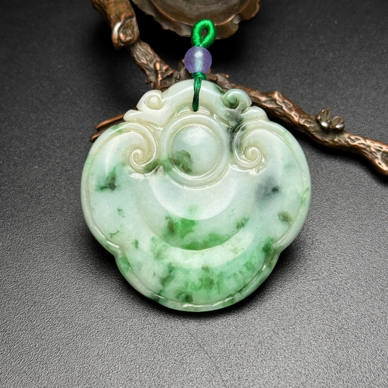 An Exquisite Jadeite Pendant: An Exquisite Jadeite Pendant,Qing Dynasty,China,Size:53mmx54mmx5mm,Weight:31g 翡翠挂件,中国清代