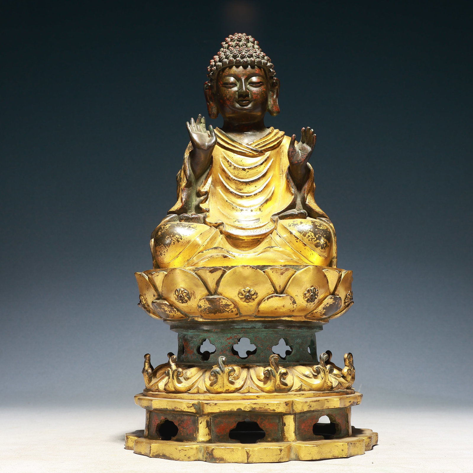 A Solemn Gilt Bronze Statue of Sakyamuni: A Solemn Gilt Bronze Statue of Sakyamuni,Qing Dynasty,China,Size:8.7inx15.7in,Weight:8250g 铜鎏金如来像,中国清代