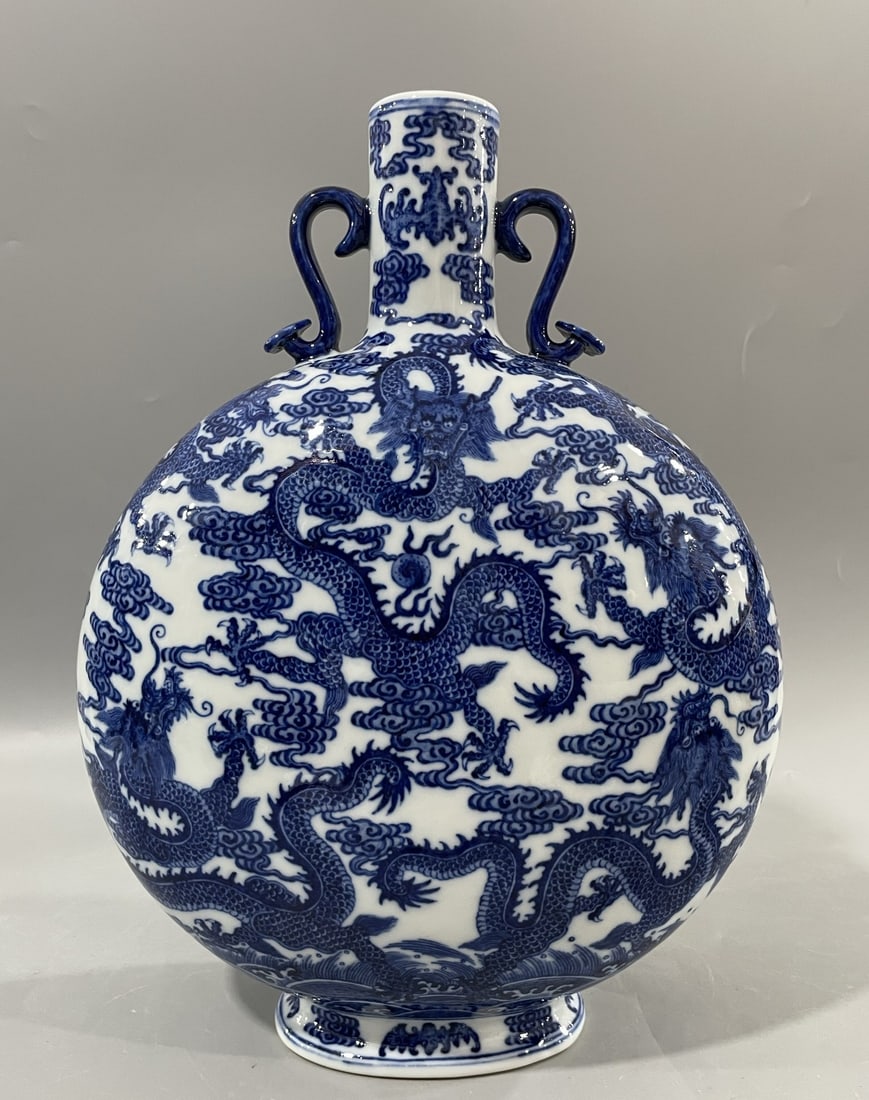 A Rare Blue and White Auspicious Cloud and Dragon Pattern Double-Ears Vase: A Rare Blue and White Auspicious Cloud and Dragon Pattern Double-Ears Vase,Qing Dynasty,China,Qianlong Six-character Mark,Size:14inx8.3in