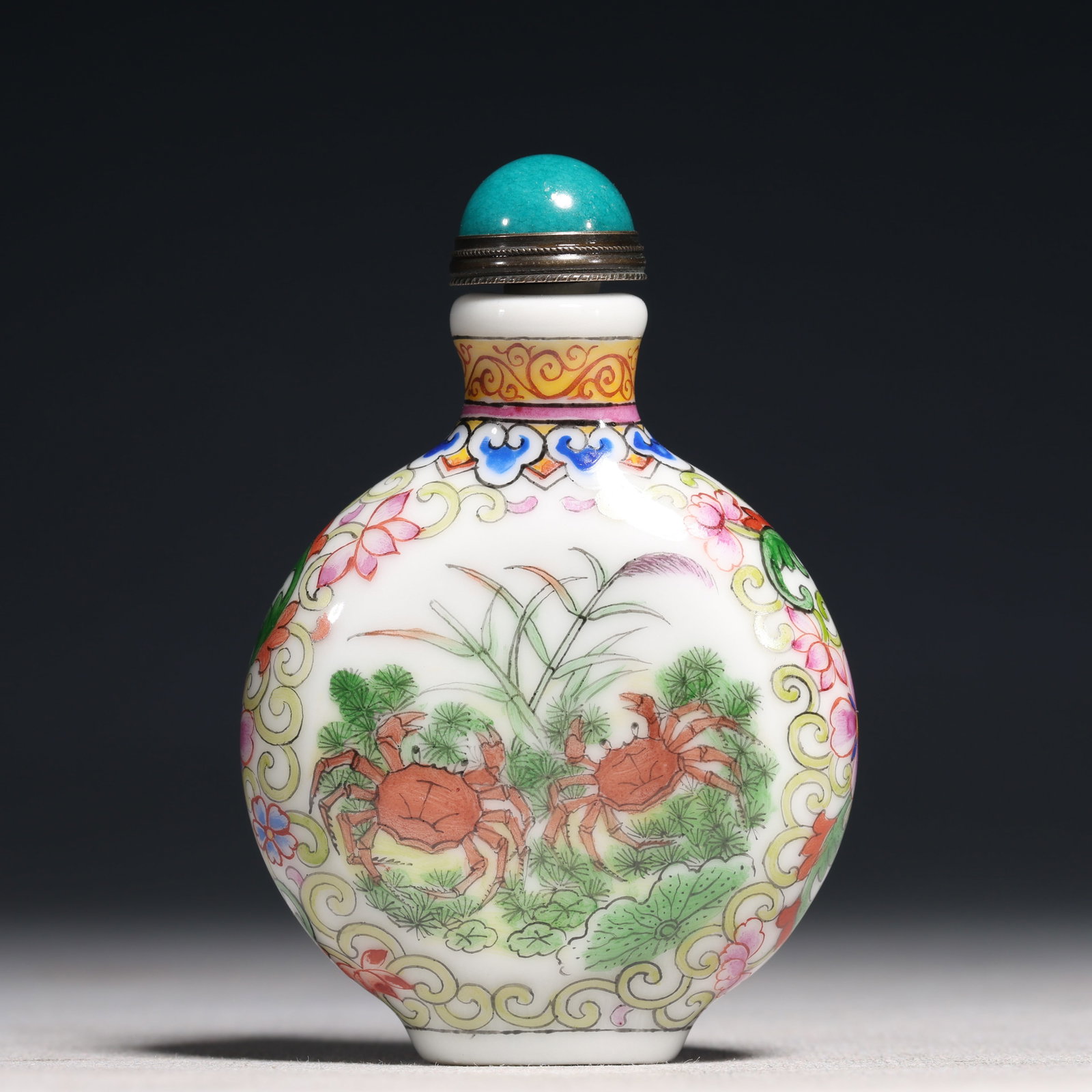 An Exquisite Painted Enamel Lotus and Crab Pattern Porcelain Snuff Bottle: An Exquisite Painted Enamel Lotus and Crab Pattern Porcelain Snuff Bottle,Qing Dynasty,China,Daoguang Four-character Mark,Size:2.2inx0.8inx3.1in 瓷胎画珐琅彩莲