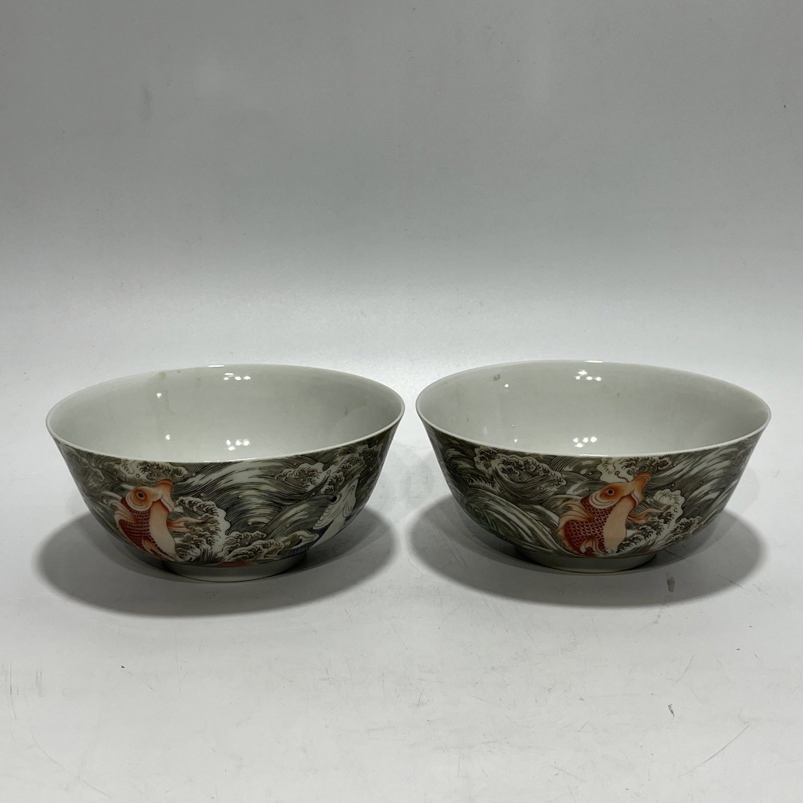 A Pair of Exquisite Wucai Seawater Fish Pattern Bowls (1 of 8)