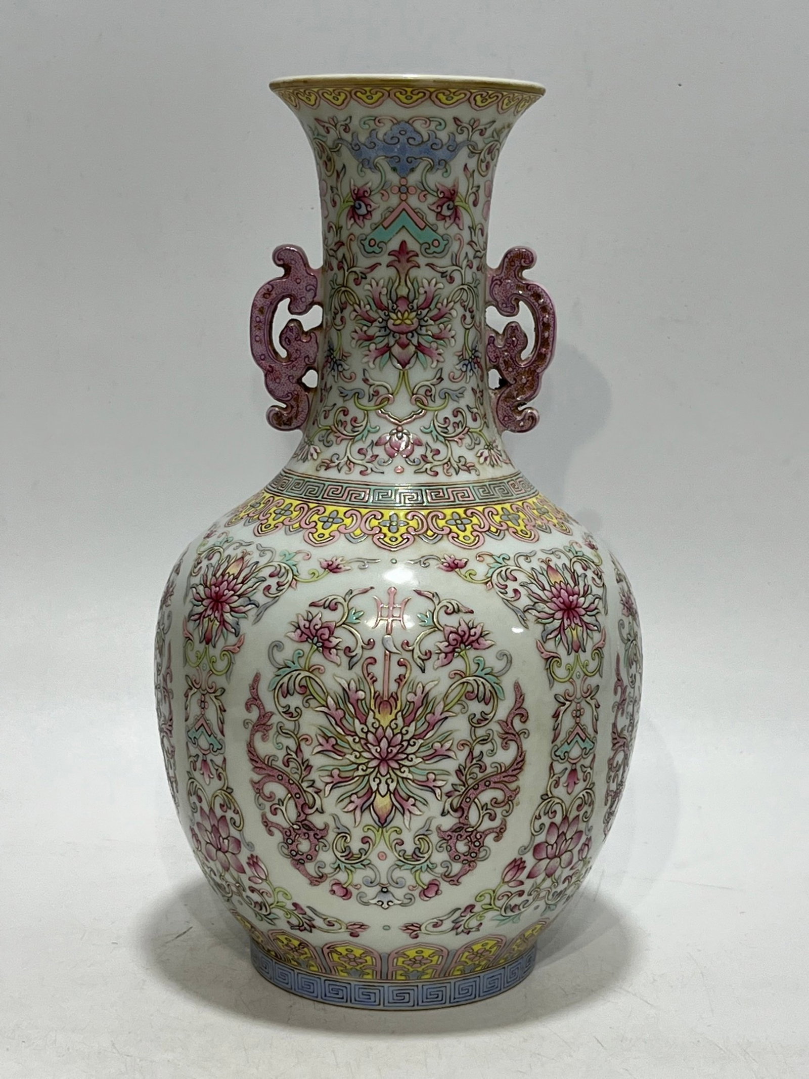 An Exquisite Famille-Rose Lotus and Dragon Pattern Double-Ears Vase: An Exquisite Famille-Rose Lotus and Dragon Pattern Double-Ears Vase,Qing Dynasty,China,Qianlong Six-character Mark,Size:11.3in 粉彩缠枝莲龙纹双耳&