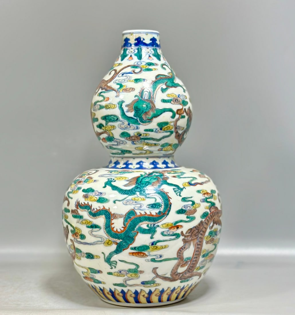 A Rare Blue and White Doucai Auspicious Cloud and Dragon Pattern Gourd-Shaped Vase (1 of 8)