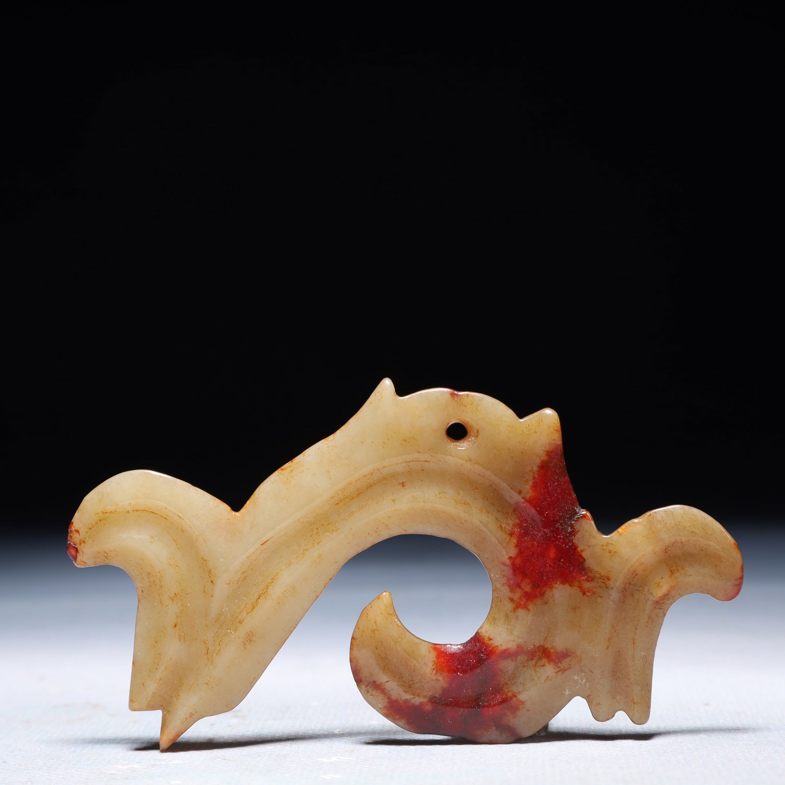 An Archaic Hongshan Culture White Jade Pendant: An Archaic Hongshan Culture White Jade Pendant,Ancient Time,China,Size:3.7inx2.2in,Weight:24.1g