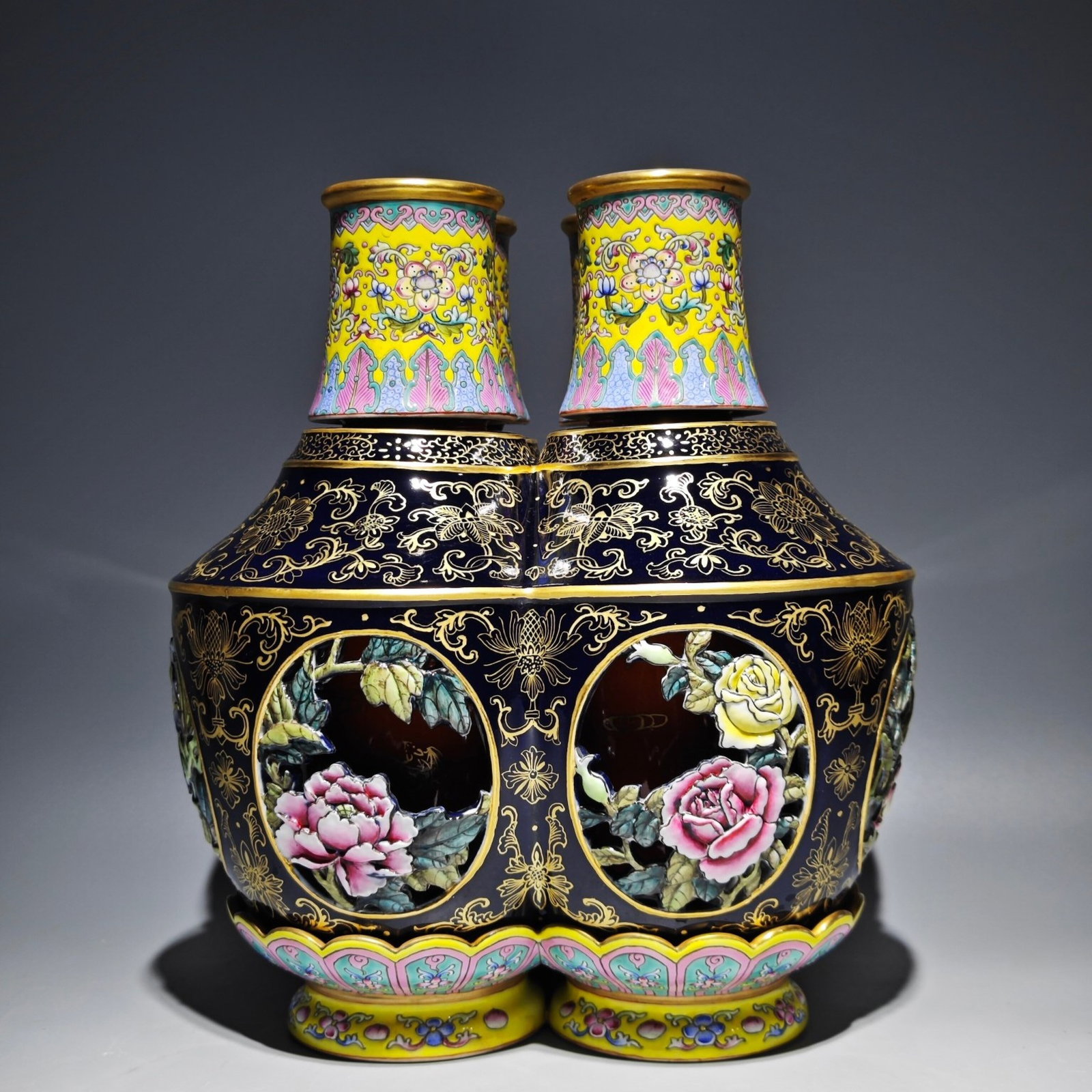 An Exquisite Enamel Ji Blue Glazed Yellow Ground Painted Gold Flower Pattern Conjoined bottles: An Exquisite Enamel Ji Blue Glazed Yellow Ground Painted Gold Flower Pattern Conjoined bottles,Qing Dynasty,China,Qianlong Six-character Mark,Size:11inx9.8in 珐琅彩霁蓝&#