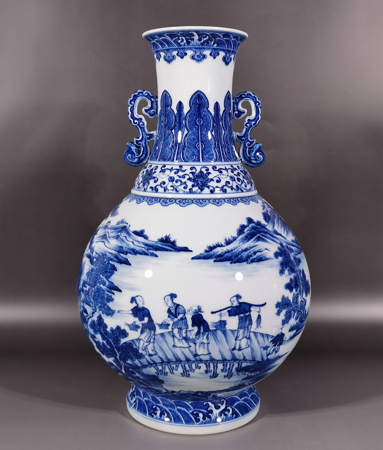 A Rare Blue and White Landscape and Figure Pattern Double-Ears Vase: A Rare Blue and White Landscape and Figure Pattern Double-Ears Vase,Qing Dynasty,China,Qianlong Six-character Mark,Size:15.4inx4.1inx9.1in