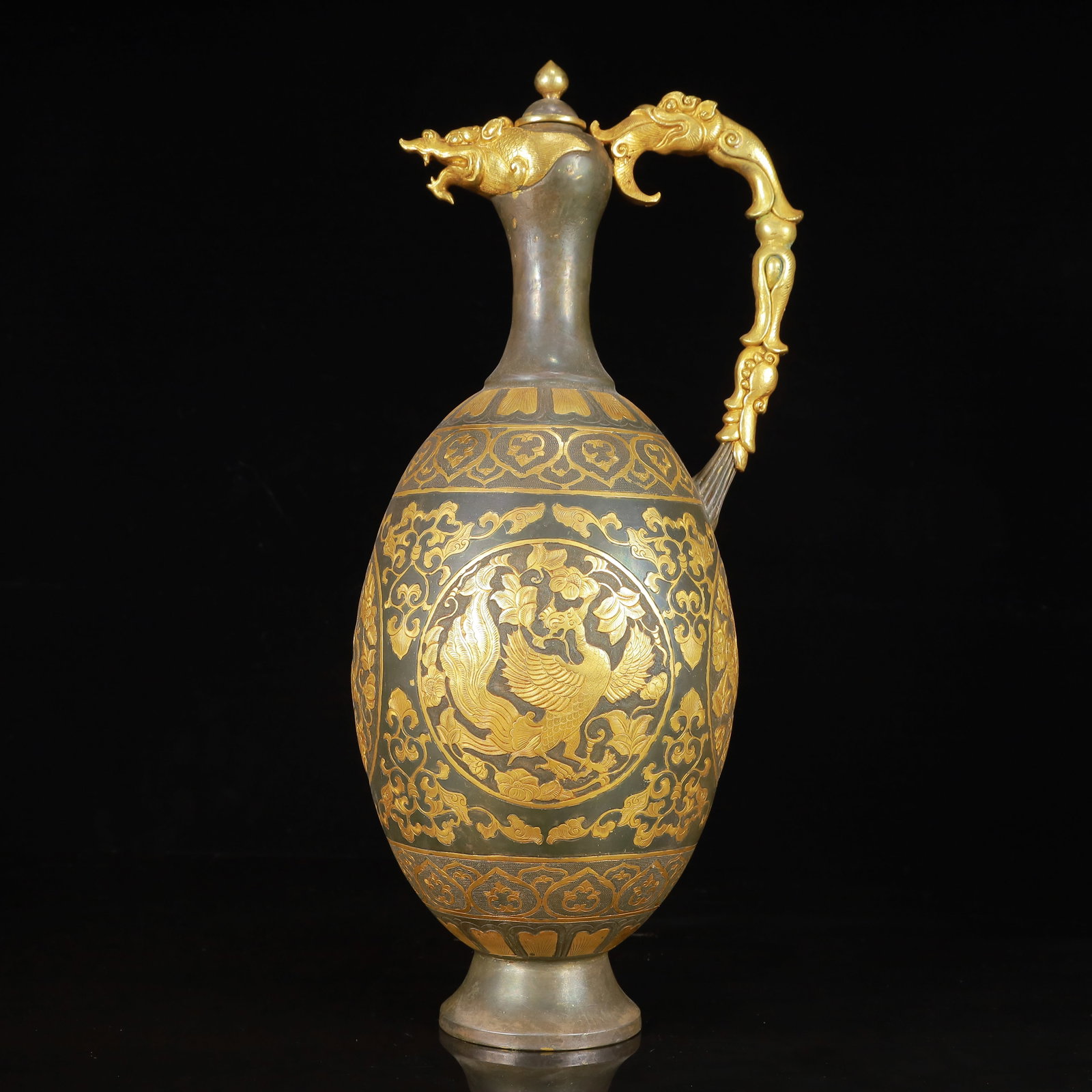A Huge Gilt Silver Auspicious Beast Pattern Ewer: A Huge Gilt Silver Auspicious Beast Pattern Ewer,Tang Dynasty,China,Zhenguan Four-Character Mark,Size:6.3inx5.5inx15.7in,Weight:2350g 银鎏金瑞兽纹执壶,&