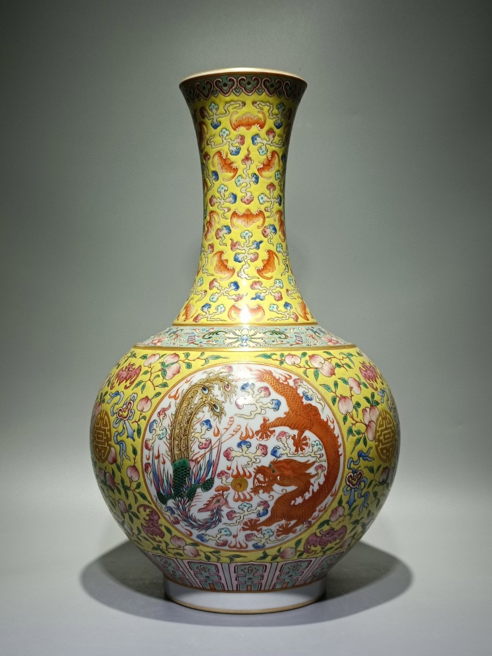 A Huge Famille-Rose Yellow Ground Painted Gold Bats and Dragon and Phoenix Pattern Vase: A Huge Famille-Rose Yellow Ground Painted Gold Bats and Dragon and Phoenix Pattern Vase,Qing Dynasty,China,Guangxu Six-character Mark,Size:15.9inx9.6in 粉彩黄地描金