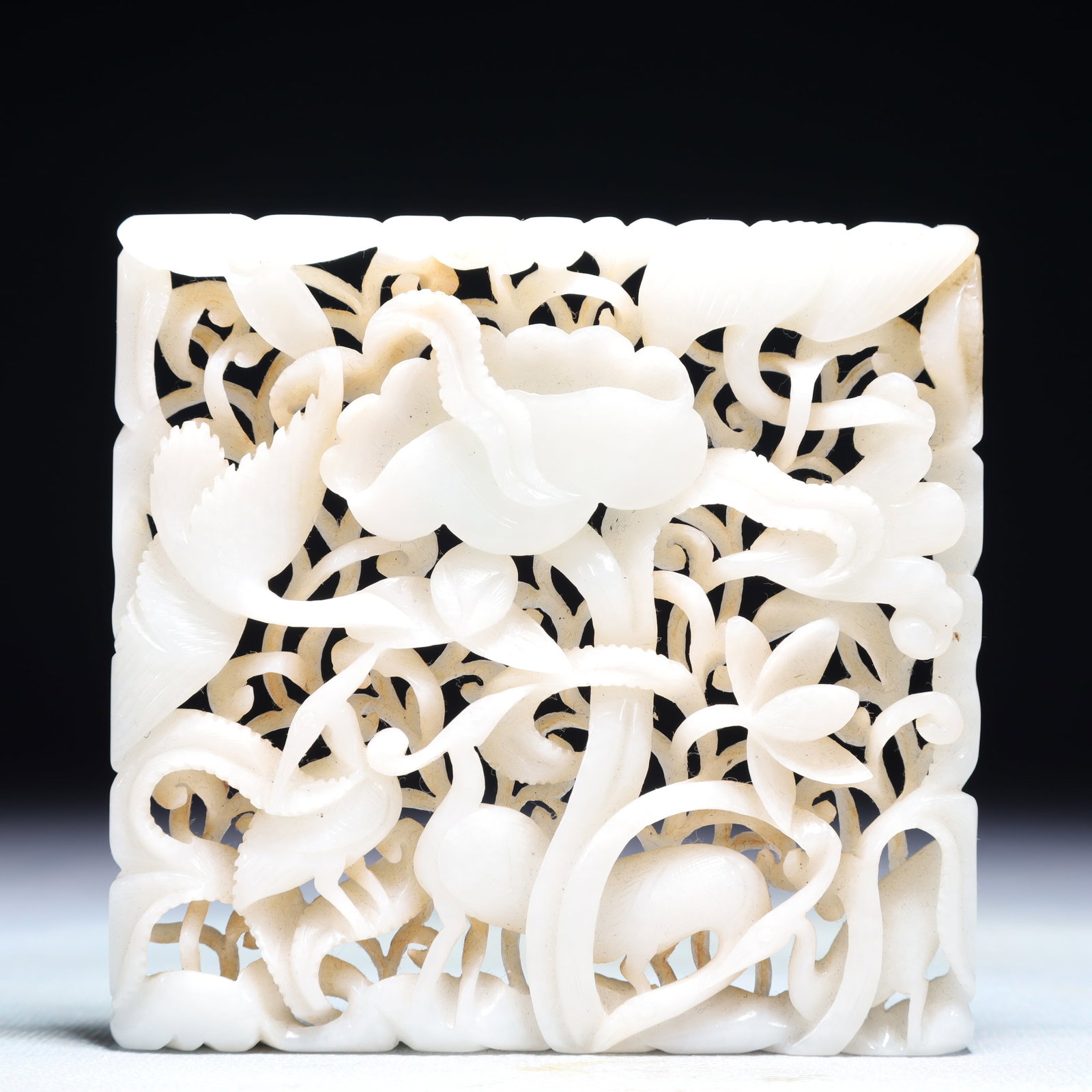 An Exquisite White Jade Flower Pattern Pendant: An Exquisite White Jade Flower Pattern Pendant,Qing Dynasty,China,Size:3.7inx3.5in,Weight:135.6g 白玉花卉纹佩,中国清代