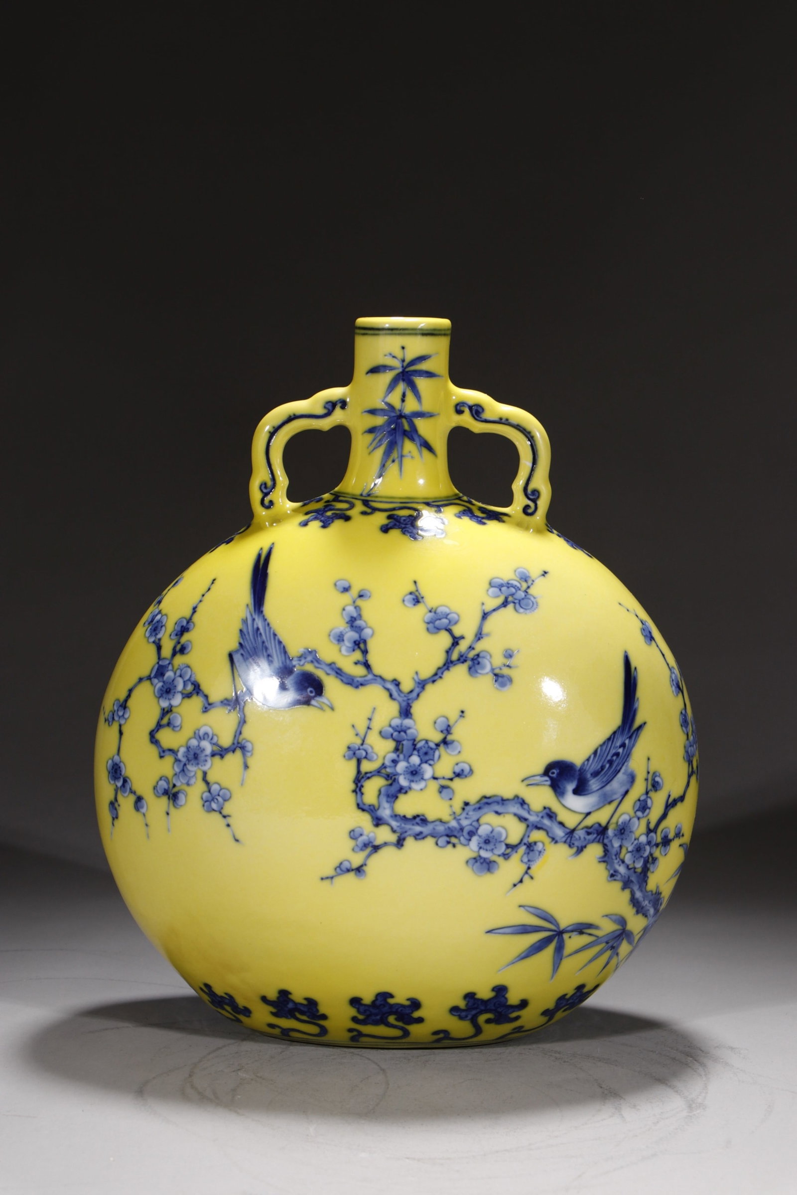 A Rare Yellow Ground Blue and White Flower and Bird Pattern Double-Ears Vase: A Rare Yellow Ground Blue and White Flower and Bird Pattern Double-Ears Vase,Qing Dynasty,China,Yongzheng Six-character Mark,Size:11.8inx9.6in 黄地青花花鸟纹&