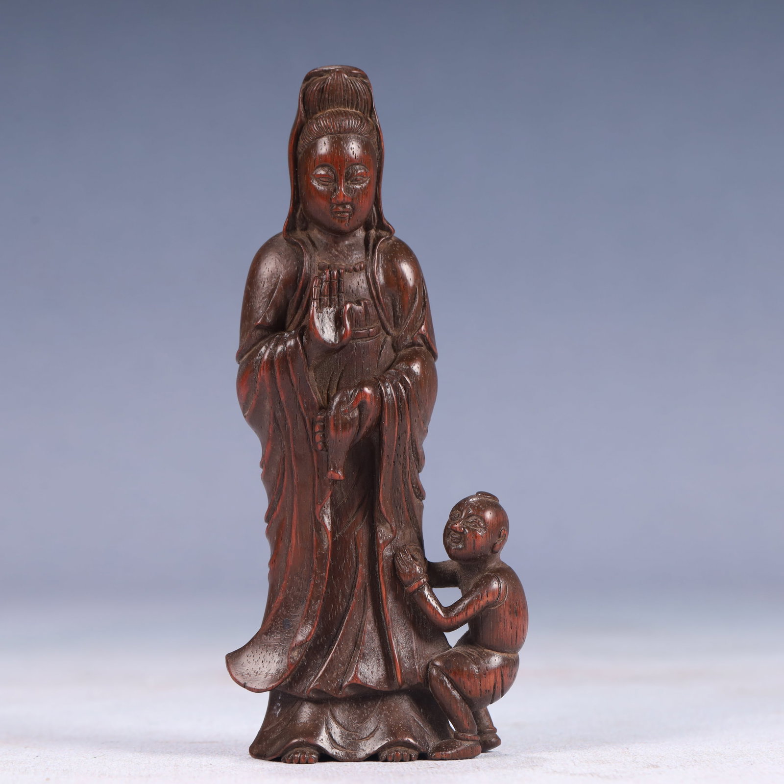An Exquisite Boxwood Statue of Avalokitesvara: An Exquisite Boxwood Statue of Avalokitesvara,Qing Dynasty, China,Size:2.2inx0.8inx4.9in,Weight:50g 黄杨木观音像,中国清代