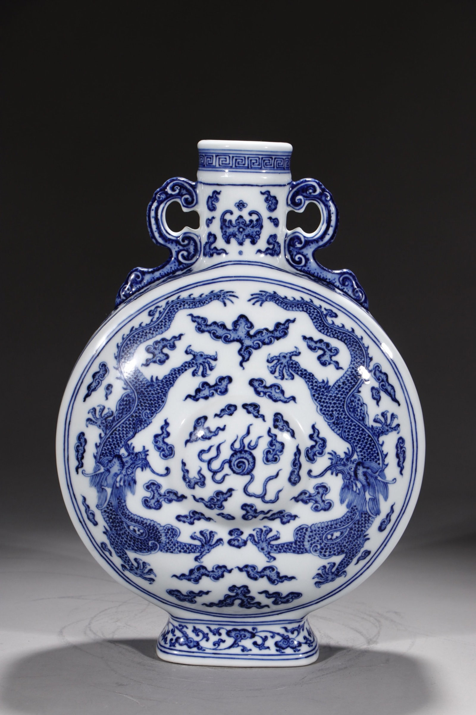 A Rare Blue and White Auspicious Cloud,Dragon and Phoenix Pattern Double-Ears Vase: A Rare Blue and White Auspicious Cloud,Dragon and Phoenix Pattern Double-Ears Vase,Qing Dynasty,China,Qianlong Six-character Mark,Size:13.4in
