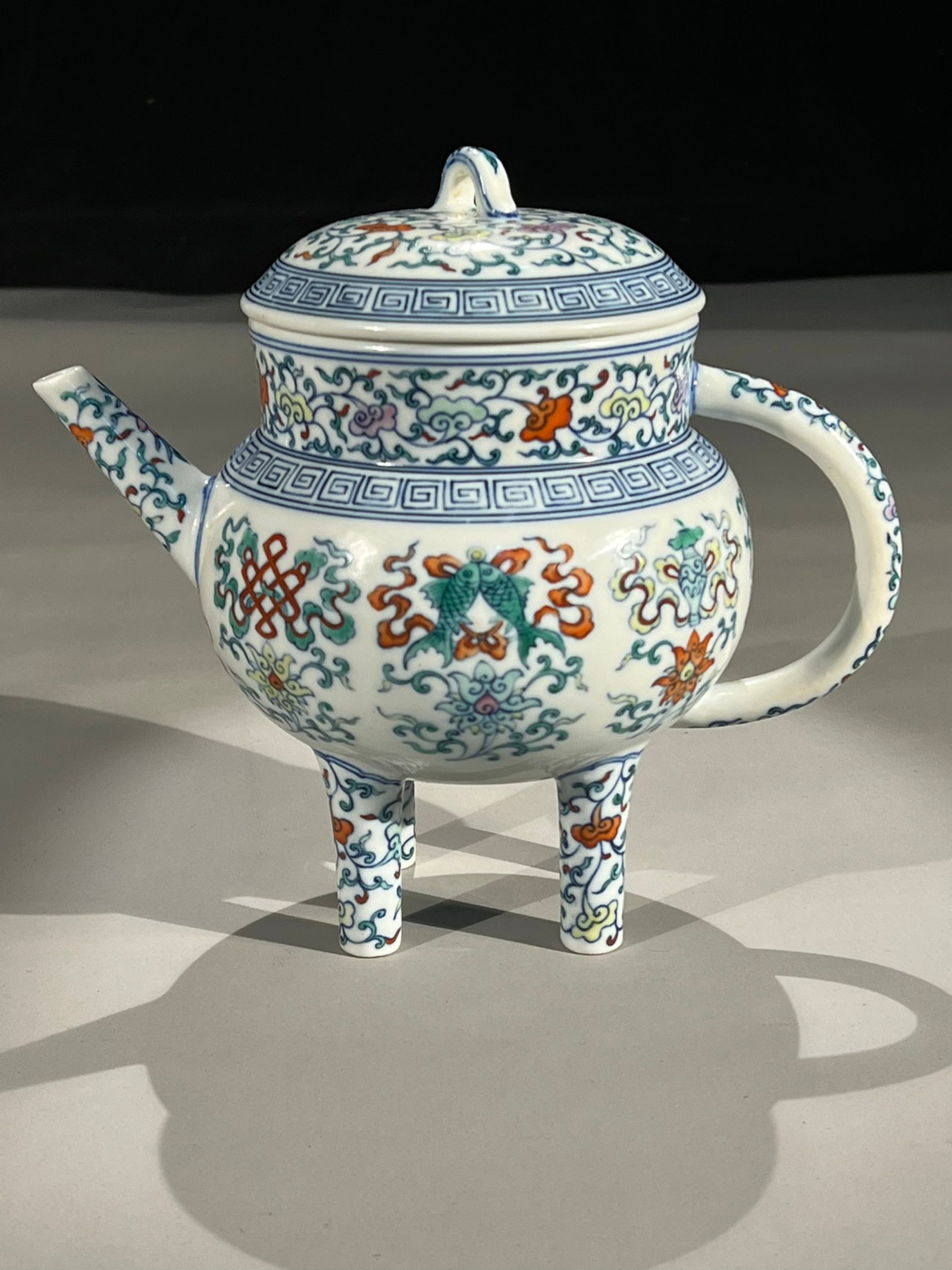 An Exquisite Blue and White Doucai Lotus and Eight Treasures Pattern four legs Ewer: An Exquisite Blue and White Doucai Lotus and Eight Treasures Pattern four legs Ewer,Qing Dynasty,China,Qianlong Six-character Mark,Size:8.7in 青花斗彩缠枝莲&#