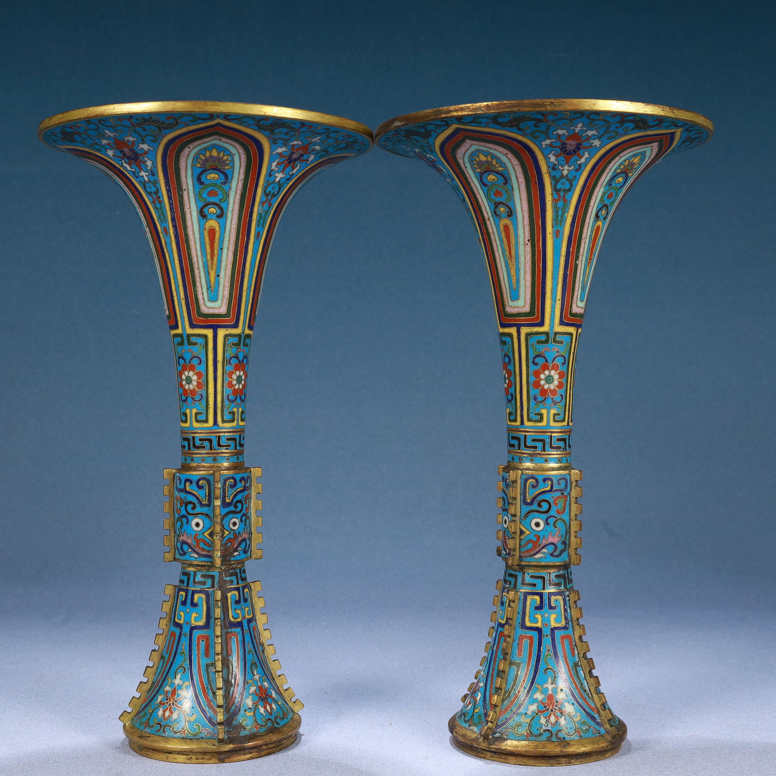 A Pair of Exquisite Cloisonne Lotus and Beast-Face Pattern Vases: A Pair of Exquisite Cloisonne Lotus and Beast-Face Pattern Vases,Qing Dynasty, China,Qianlong Four-character Mark,Size:5.9inx11in,Weight:1700g 一对景泰蓝缠枝&