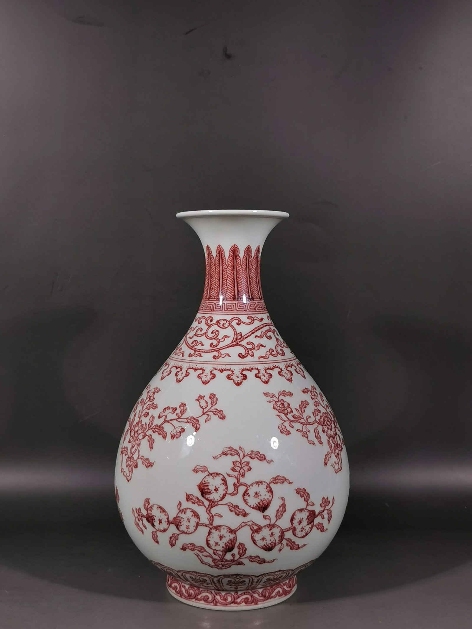 A Rare Underglaze-Red Flower and Fruit Pattern Vase: A Rare Underglaze-Red Flower and Fruit Pattern Vase,Qing Dynasty, China,Yongzheng Six-character Mark,Size:11.8inx3.5inx7.2in 釉里红花果纹瓶,中国&#