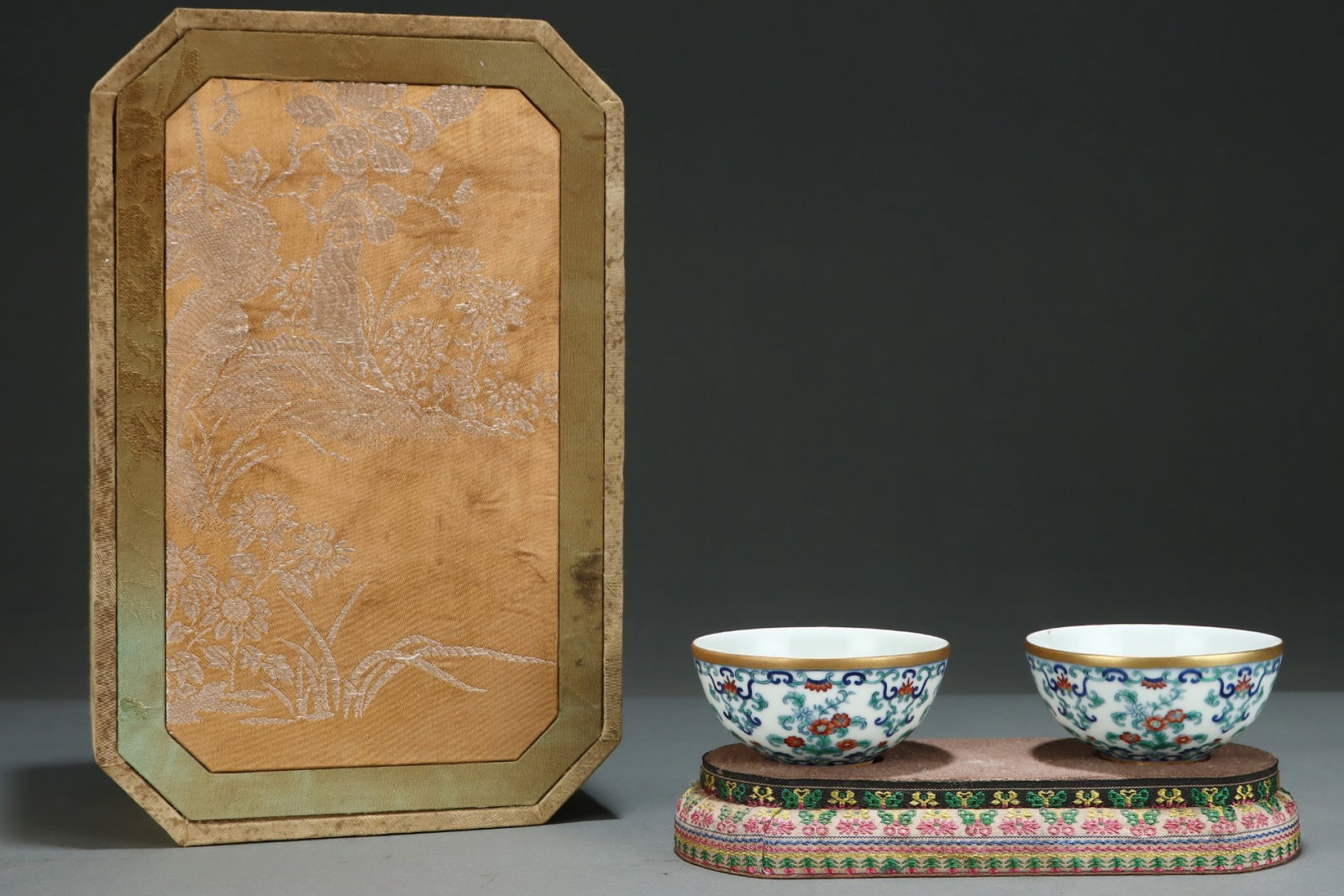 A Pair of Exquisite Doucai Flower Pattern Cups: A Pair of Exquisite Doucai Flower Pattern Cups,Qing Dynasty,China,Yongzheng Six-character Mark,Size:1.8inx3.3in 一对斗彩花卉纹杯子,中国