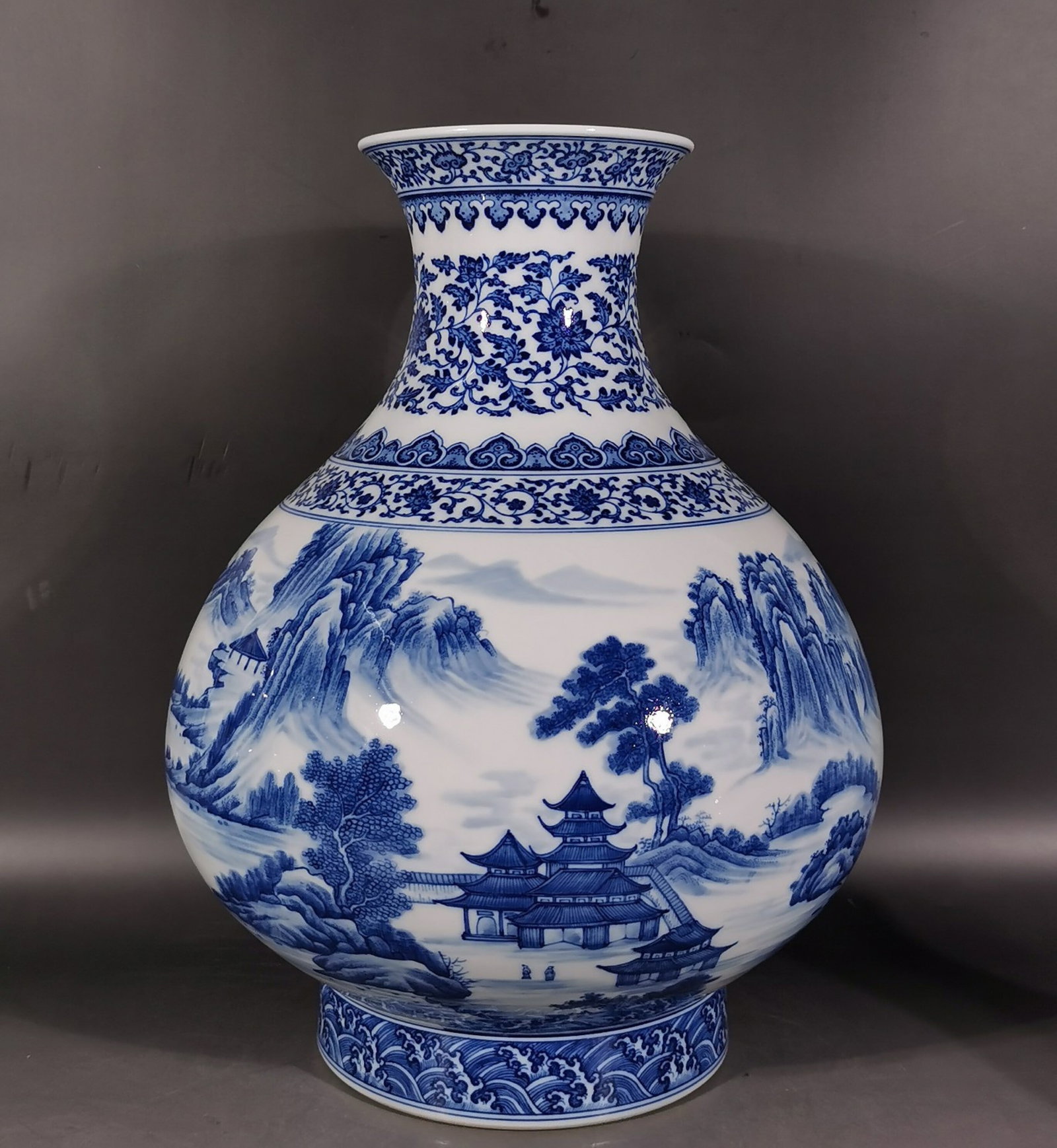 A Huge Blue and White Lotus,Landscape and Figure Pattern Vase: A Huge Blue and White Lotus,Landscape and Figure Pattern Vase,Qing Dynasty, China,Yongzheng Six-character Mark,Size:15.9inx5.6inx12.5in 青花缠枝莲山水人