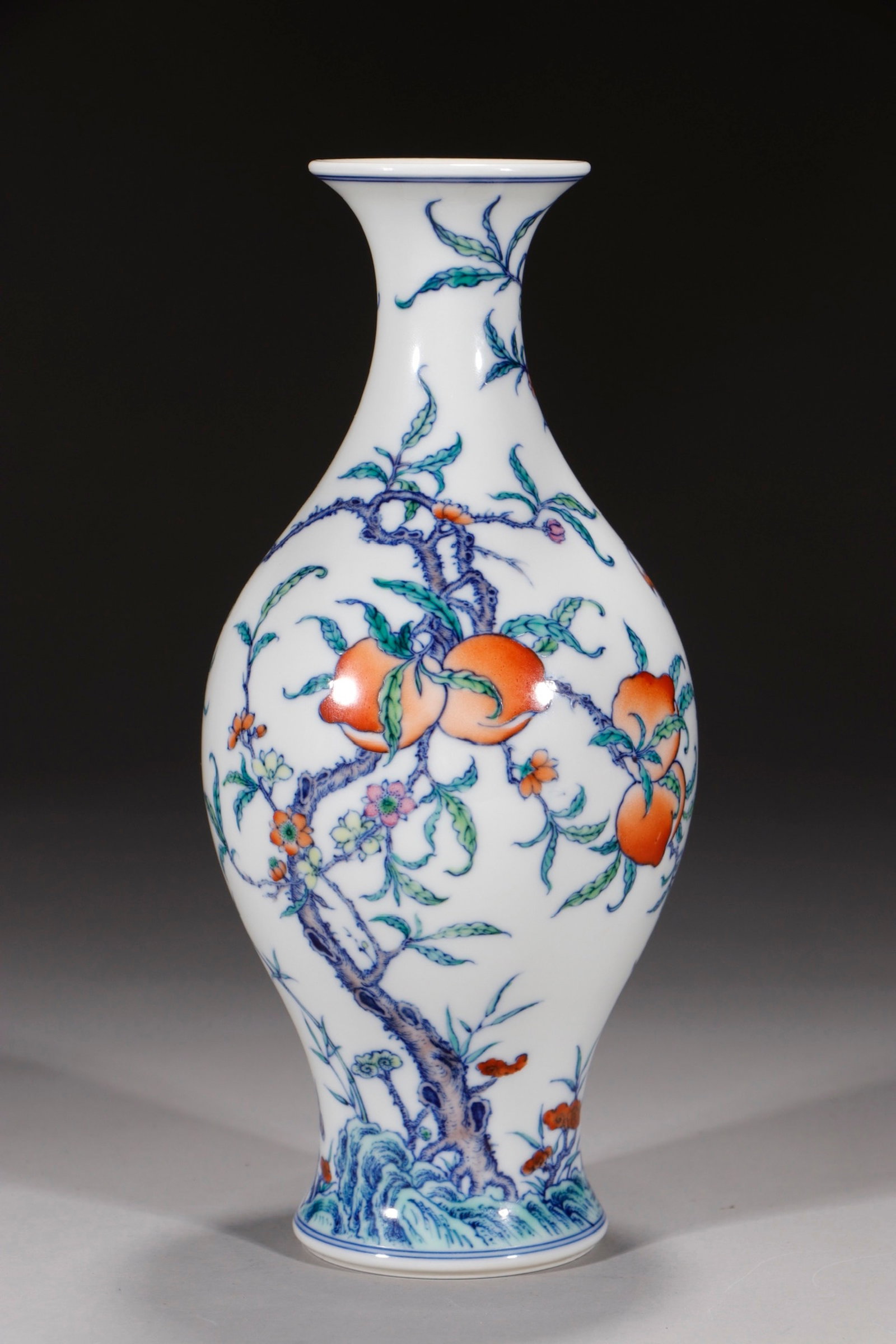 An Exquisite Doucai Bats and Peach Pattern Vase: An Exquisite Doucai Bats and Peach Pattern Vase,Qing Dynasty,China,Yongzheng Six-character Mark,Size:8.9in 斗彩蝙蝠桃子纹瓶,中国清