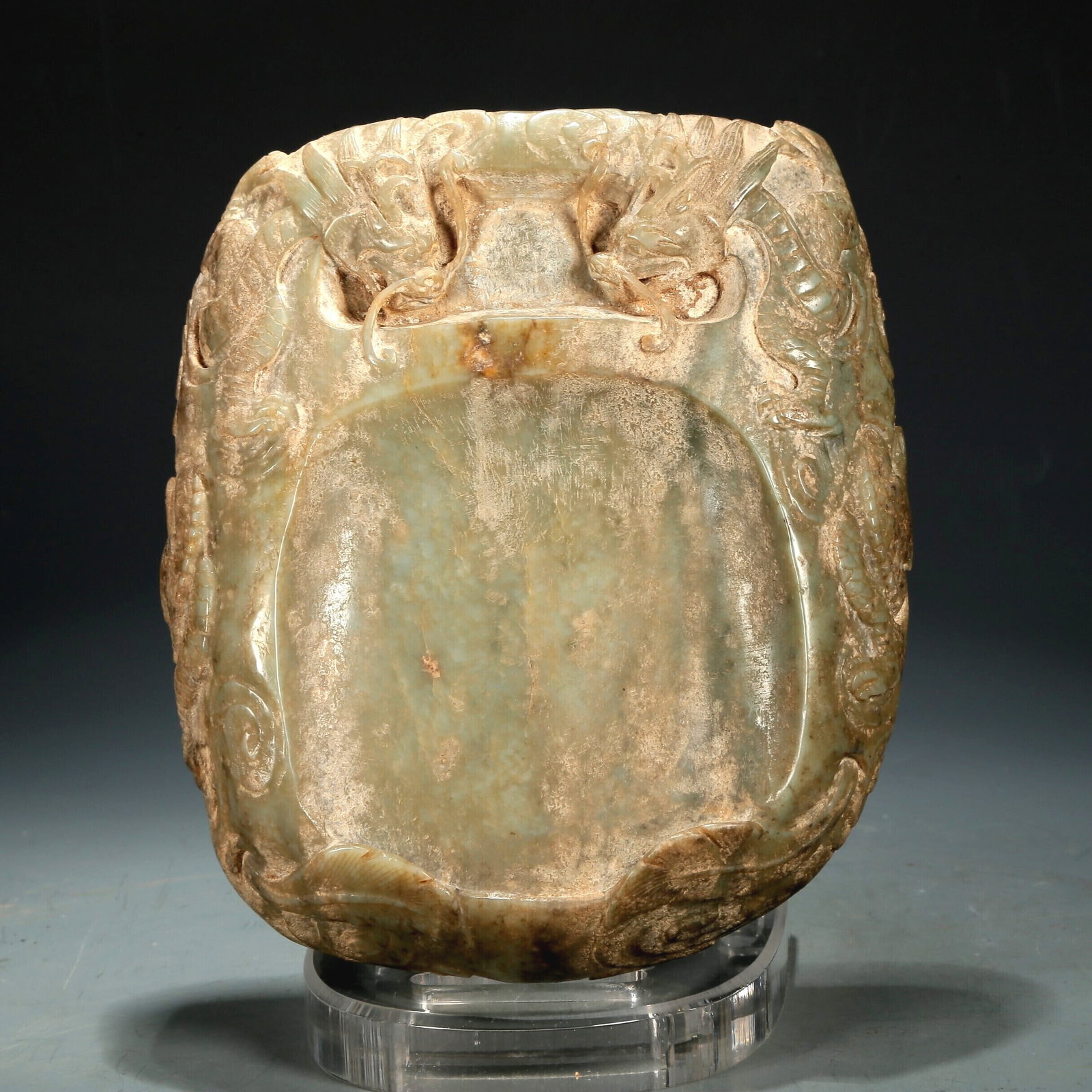 A Celadon 'Dragon' Jade Inkstone: A Celadon 'Dragon' Jade Inkstone. Chinese Yuan Dynasty. Size:5.3inx6.1inx1.5in 元代 青玉龙纹砚台