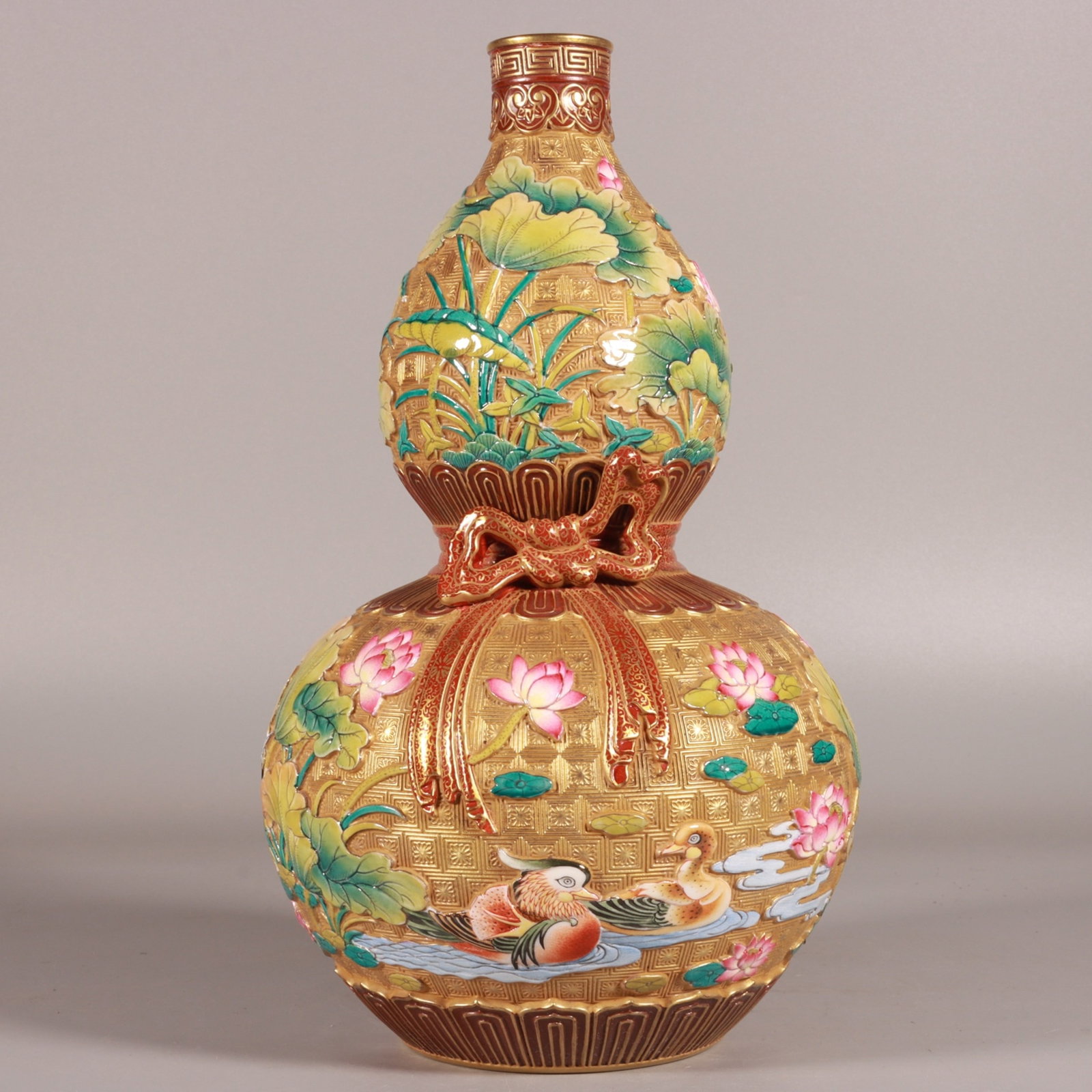 An Exquisite Enamel Gold Ground Flower and Bird Pattern Gourd Vase: An Exquisite Enamel Gold Ground Flower and Bird Pattern Gourd Vase,Qing Dynasty, China,Qianlong Six-character Mark,Size:9.4inx5.5in 珐琅彩金地花鸟纹!