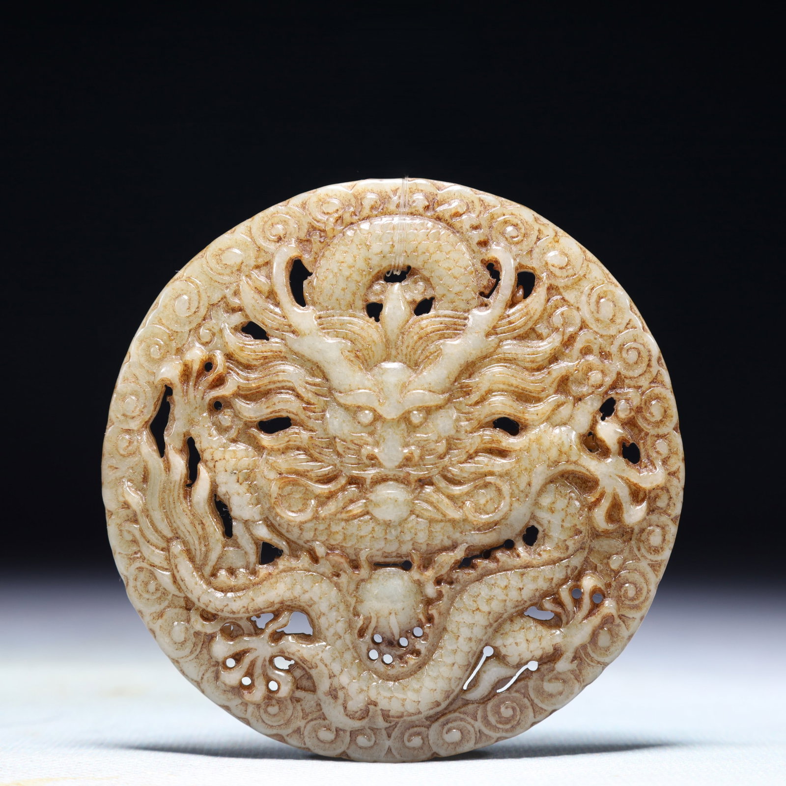 An Exquisite White Jade Dragon Pattern Pendant: An Exquisite White Jade Dragon Pattern Pendant,Qing Dynasty,China,Size:3.1inx3.1in,Weight:72g 白玉龙纹佩,中国清代