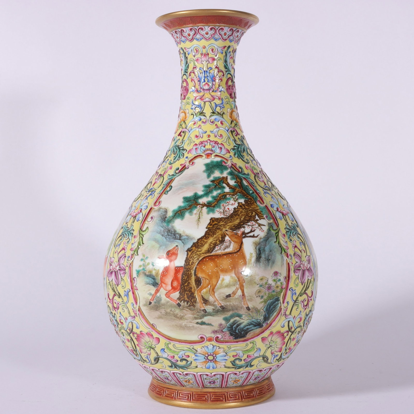 An Exquisite Enamel Yellow Ground Painted Gold Lotus and Animal Pattern Vase: An Exquisite Enamel Yellow Ground Painted Gold Lotus and Animal Pattern Vase,Qing Dynasty, China,Qianlong Six-character Mark,Size:11.5inx6.3in 珐琅彩黄地描金&