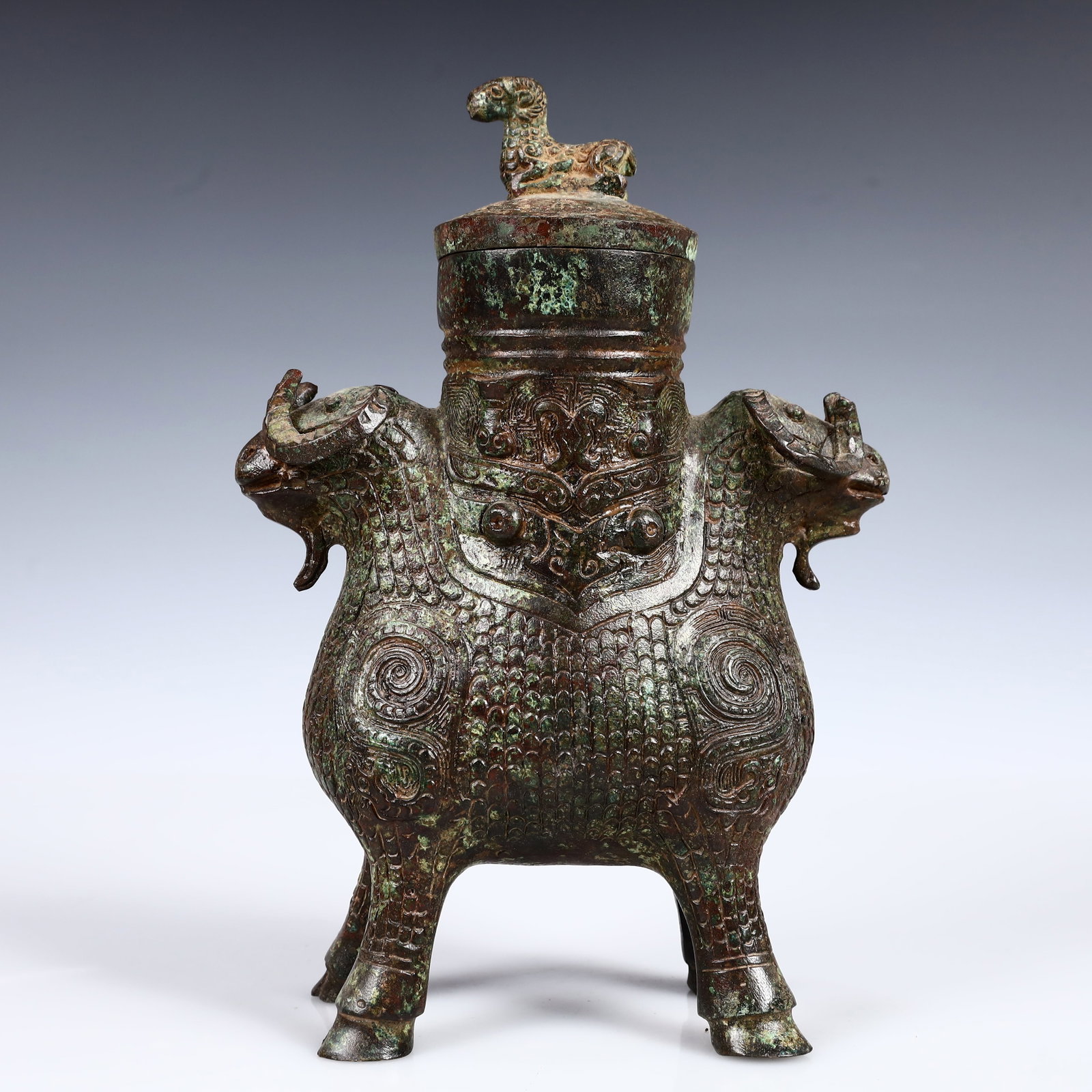 A Rare Bronze Sheep Zun: A Rare Bronze Sheep Zun,W.Zhou,China,Size:6.7inx3.1inx9.4in,Weight:1900g 青铜羊尊,中国西周时期