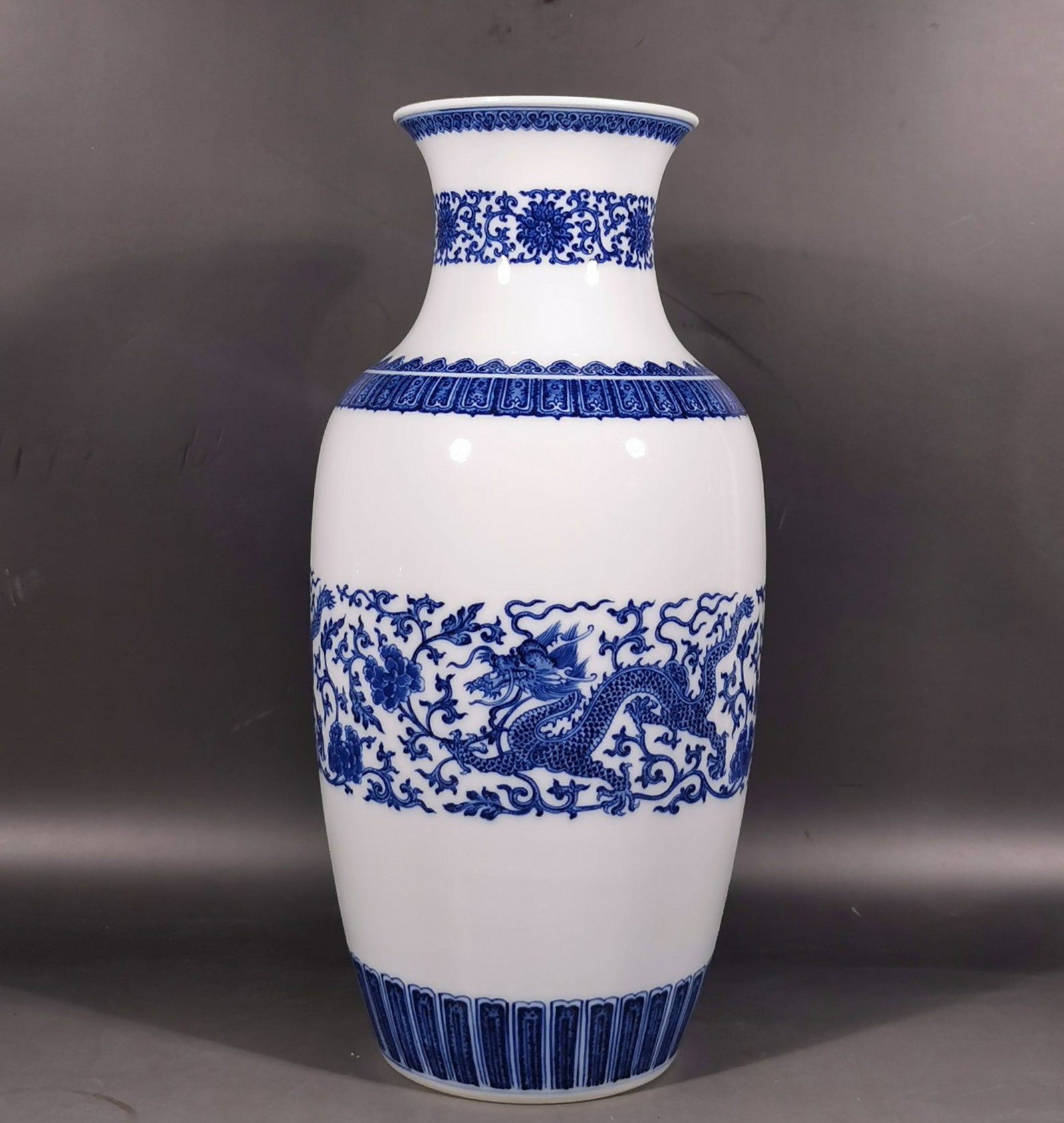 A Rare Blue and White Lotus and Dragon Pattern Vase: A Rare Blue and White Lotus and Dragon Pattern Vase,Qing Dynasty, China,Qianlong Six-character Mark,Size:15.6inx5inx7.5in