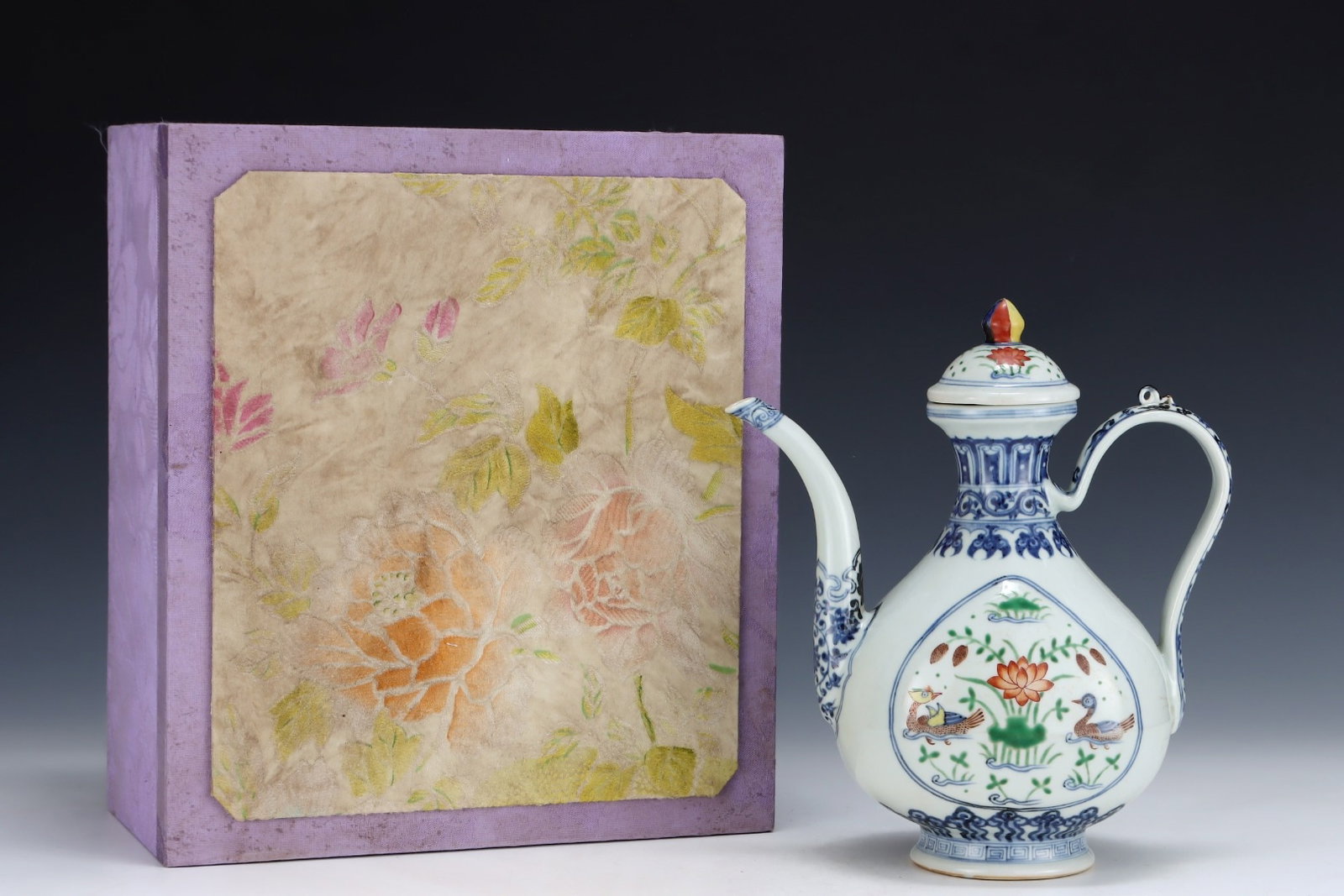 An Exquisite Blue and White Wucai Mandarin Duck Pattern Ewer: An Exquisite Blue and White Wucai Mandarin Duck Pattern Ewer,Ming Dynasty,China,Xuande Six-character Mark,Size:10.2inx9.1in 青花五彩鸳鸯纹执壶,