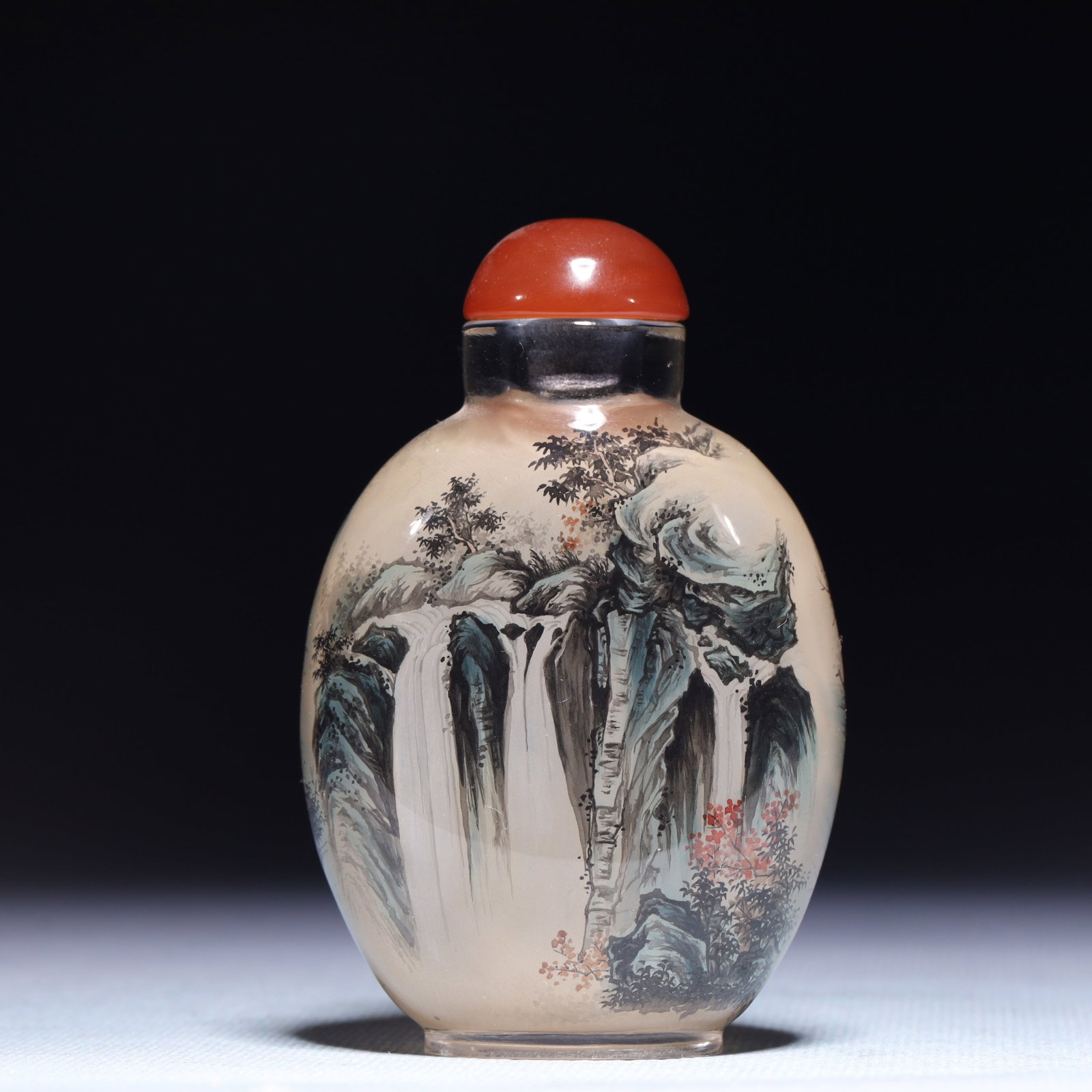 An Exquisite Glass Landscape and Figure Pattern Snuff Bottle: An Exquisite Glass Landscape and Figure Pattern Snuff Bottle,Qing Dynasty,China,Size:2.2inx1.2inx3.1in,Weight:82.5g 琉璃山水人物纹鼻烟壶,
