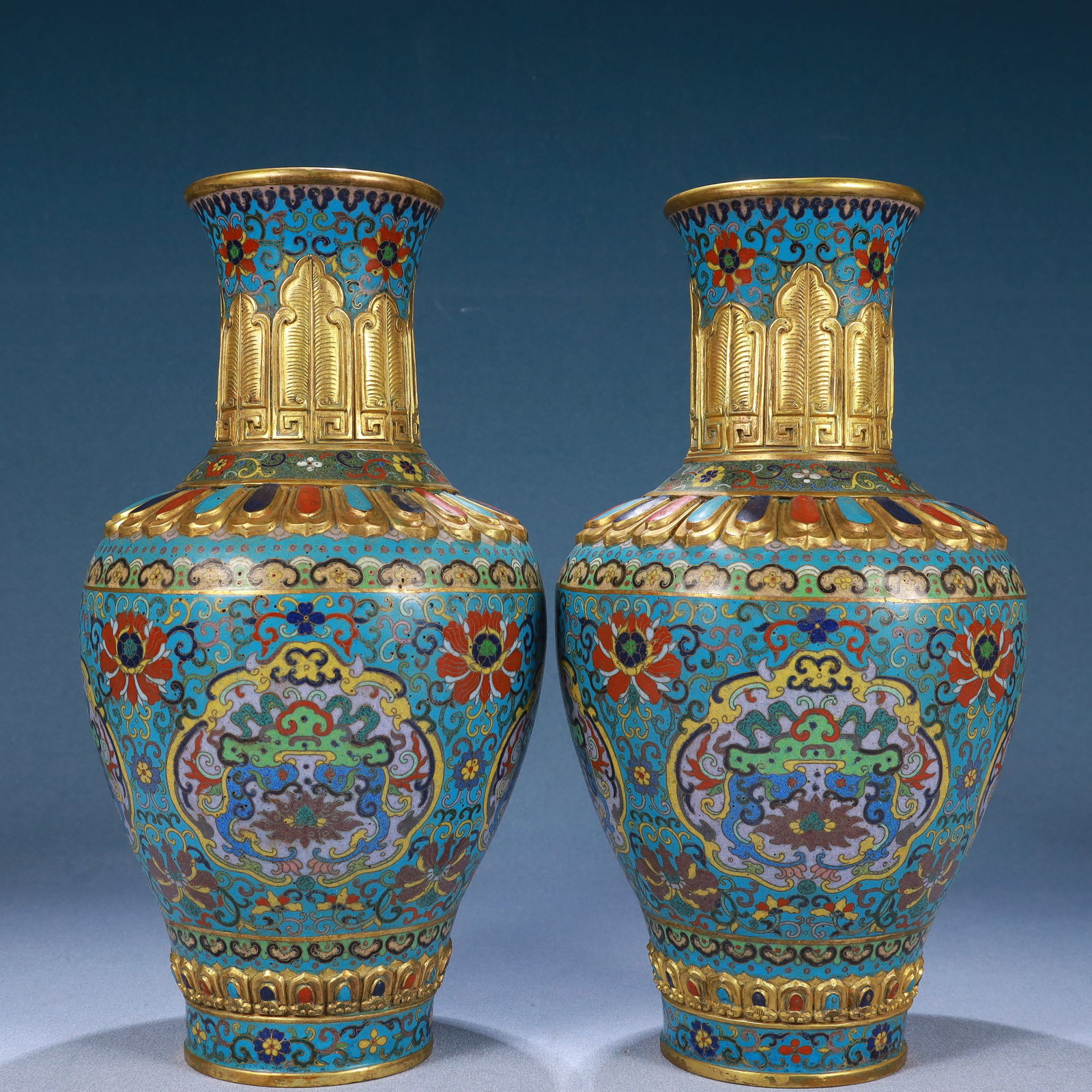 A Pair of Rare Cloisonne Lotus Pattern Vases: A Pair of Rare Cloisonne Lotus Pattern Vases,Qing Dynasty, China,Qianlong Four-character Mark,Size:12.2inx3.5inx6.3in,Weight:3300g 一对景泰蓝缠枝莲ń