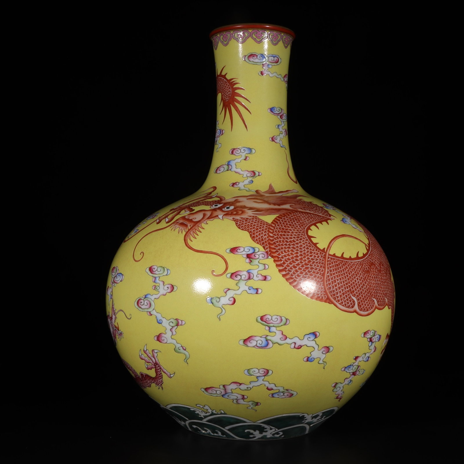 A Huge Famille-Rose Yellow Ground Painted Gold Seawater Auspicious Cloud and Dragon Pattern Vase: A Huge Famille-Rose Yellow Ground Painted Gold Seawater Auspicious Cloud and Dragon Pattern Vase,Qing Dynasty, China,Qianlong Six-character Mark,Size:20.5inx4.6inx7.2in 粉彩黄地