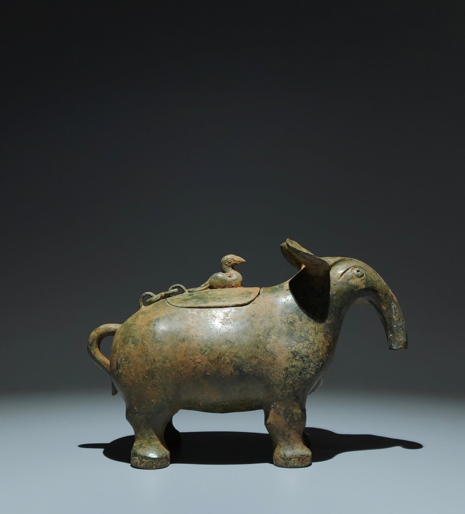 An Archaic Bronze Beast-Shaped Food Vessel: An Archaic Bronze Beast-Shaped Food Vessel,W.Zhou,China,Size:6.7inx10.2inx3.9in 青铜兽形食器,中国西周时期