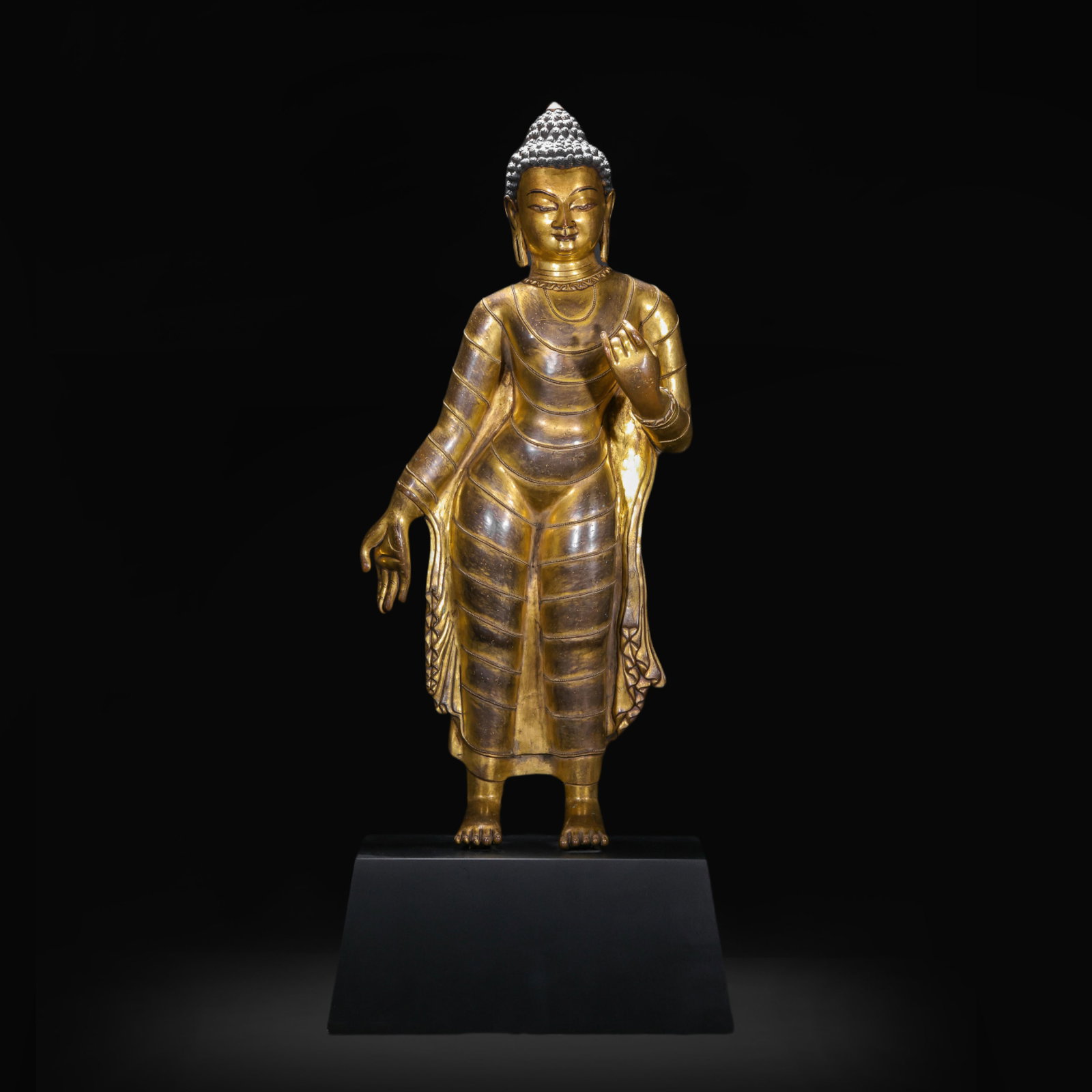 A Solemn Gilt Bronze Statue of Sakyamuni: A Solemn Gilt Bronze Statue of Sakyamuni,Ming Dynasty,China,Size:11.8inx5.9inx27.6in,Weight:11500g 铜鎏金释迦摩尼像,中国明代
