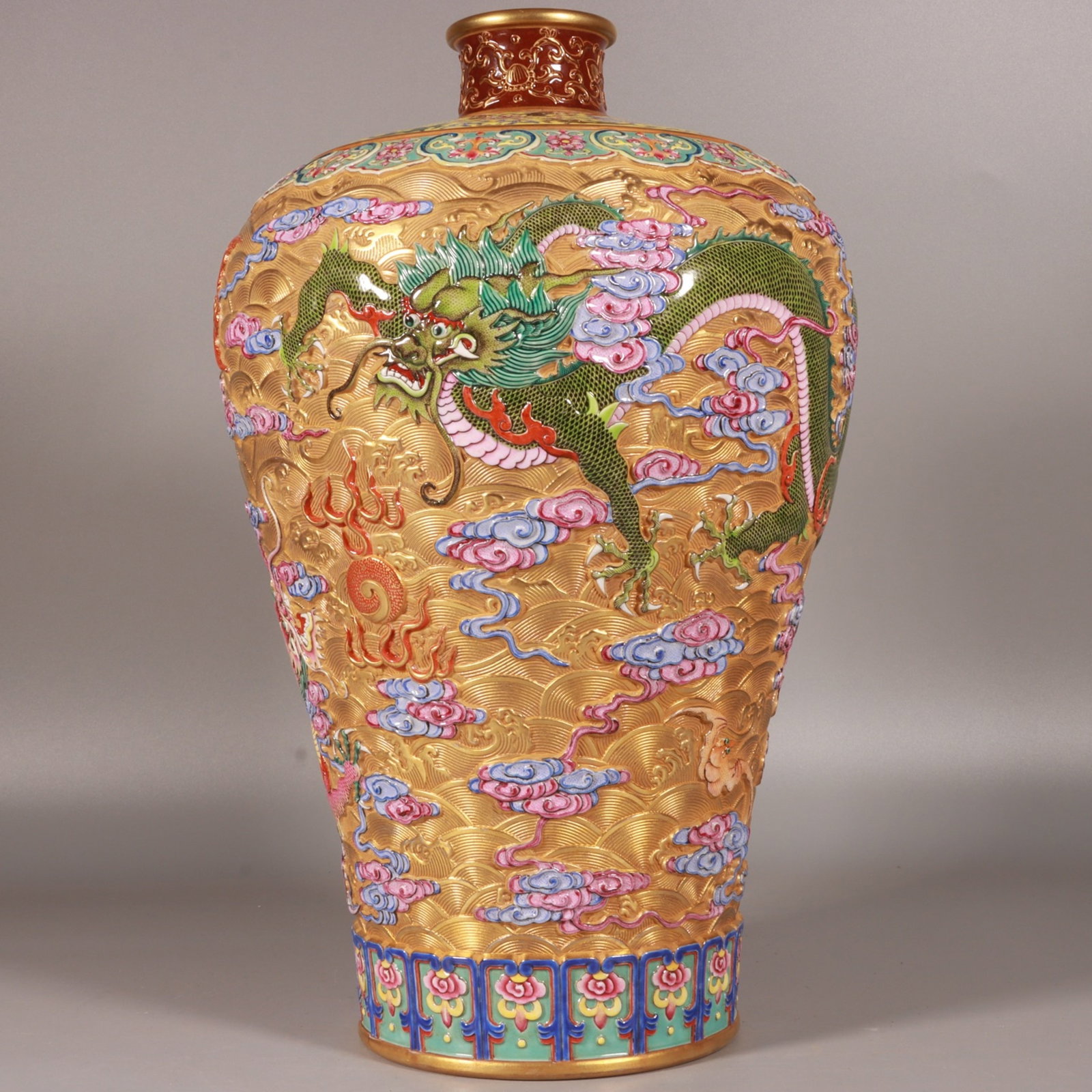 A Rare Enamel Gold Ground Seawater Auspicious Cloud and Dragon Pattern Vase: A Rare Enamel Gold Ground Seawater Auspicious Cloud and Dragon Pattern Vase,Qing Dynasty, China,Qianlong Six-character Mark,Size:14.2inx8.3in