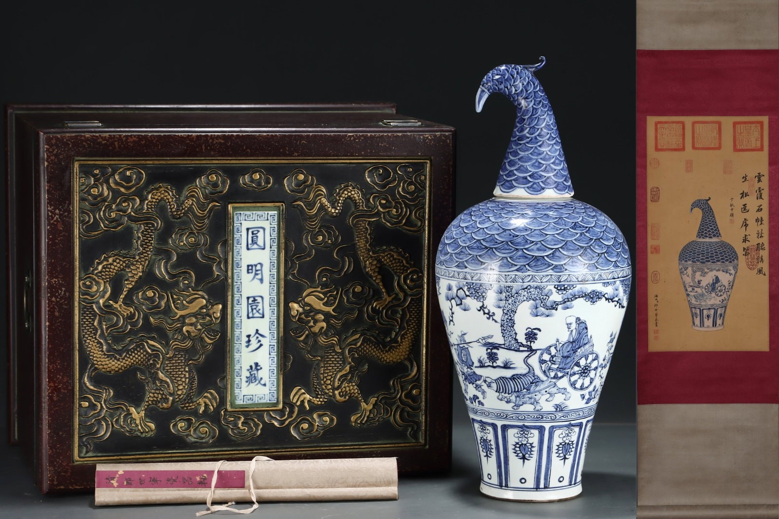 A Huge Blue and White Seawater Character and Story Pattern Vase,With Phoenix-head Cover,With: A Huge Blue and White Seawater Character and Story Pattern Vase,With Phoenix-head Cover,With Vertical Scroll Painting on Silk,Yuan Dynasty, China,Size:22.4inx9.8in,(Without frame)24.4inx12.6in 青