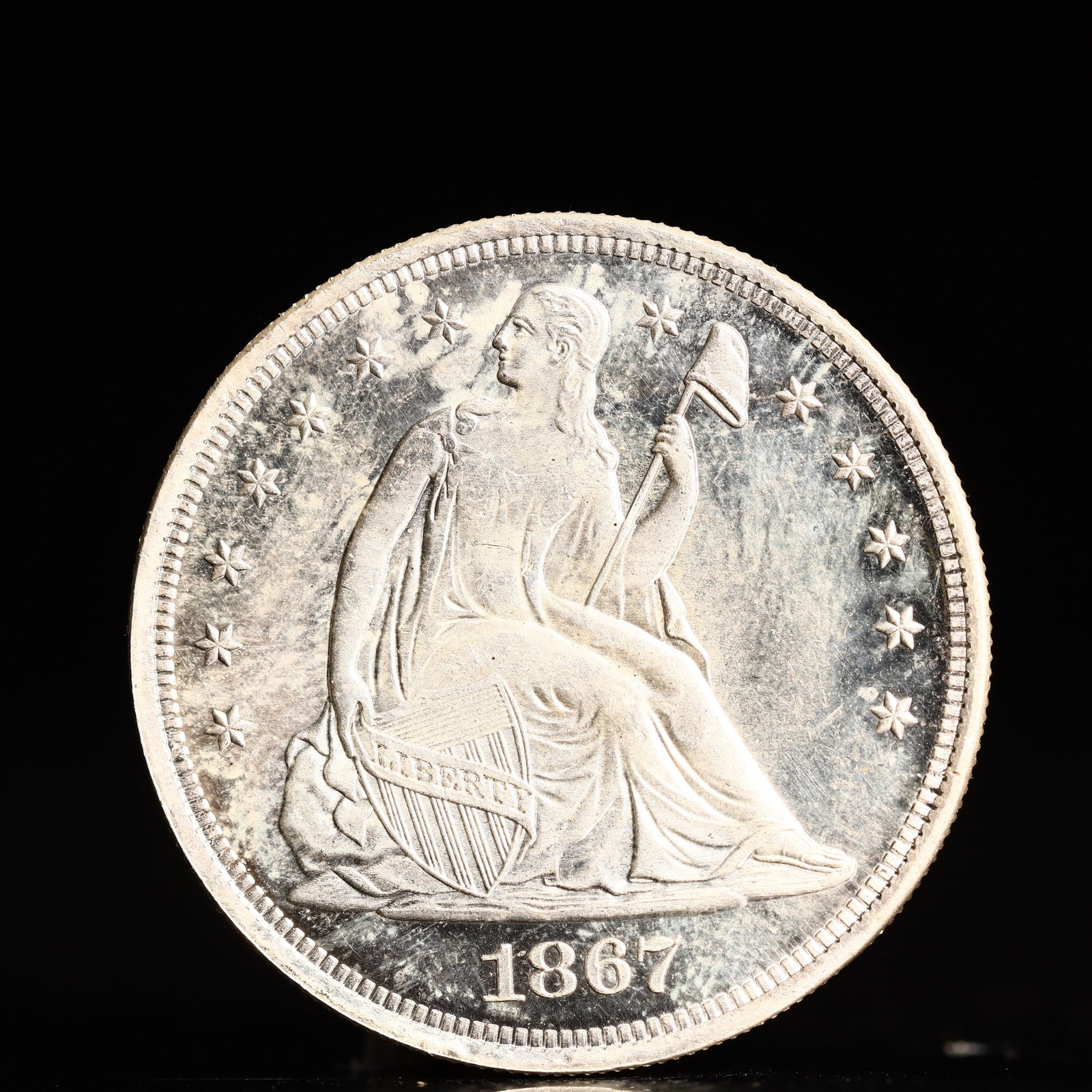 USA One Dollar 1867 Coin: American coin. IN GOD WE TRUST / LIBERTY / 1867 / UNITED STATES OF AMERICA / ONE DOL. Weight:26.9g.
