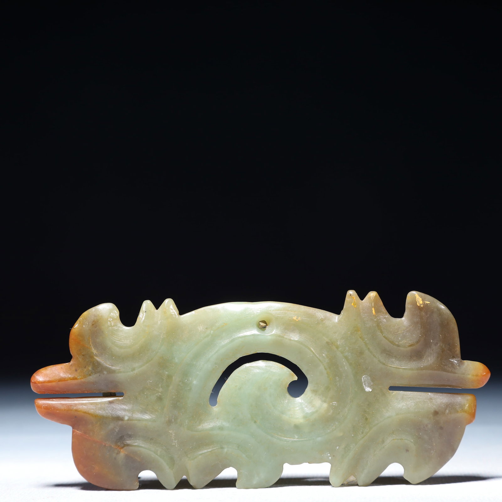 An Archaic Hongshan Culture Greenish Jade Auspicious Cloud Pattern Pendant: An Archaic Hongshan Culture Greenish Jade Auspicious Cloud Pattern Pendant,Ancient Time,China,Size:4.5inx2in,Weight:2.34g 红山文化青白玉祥云ಬ