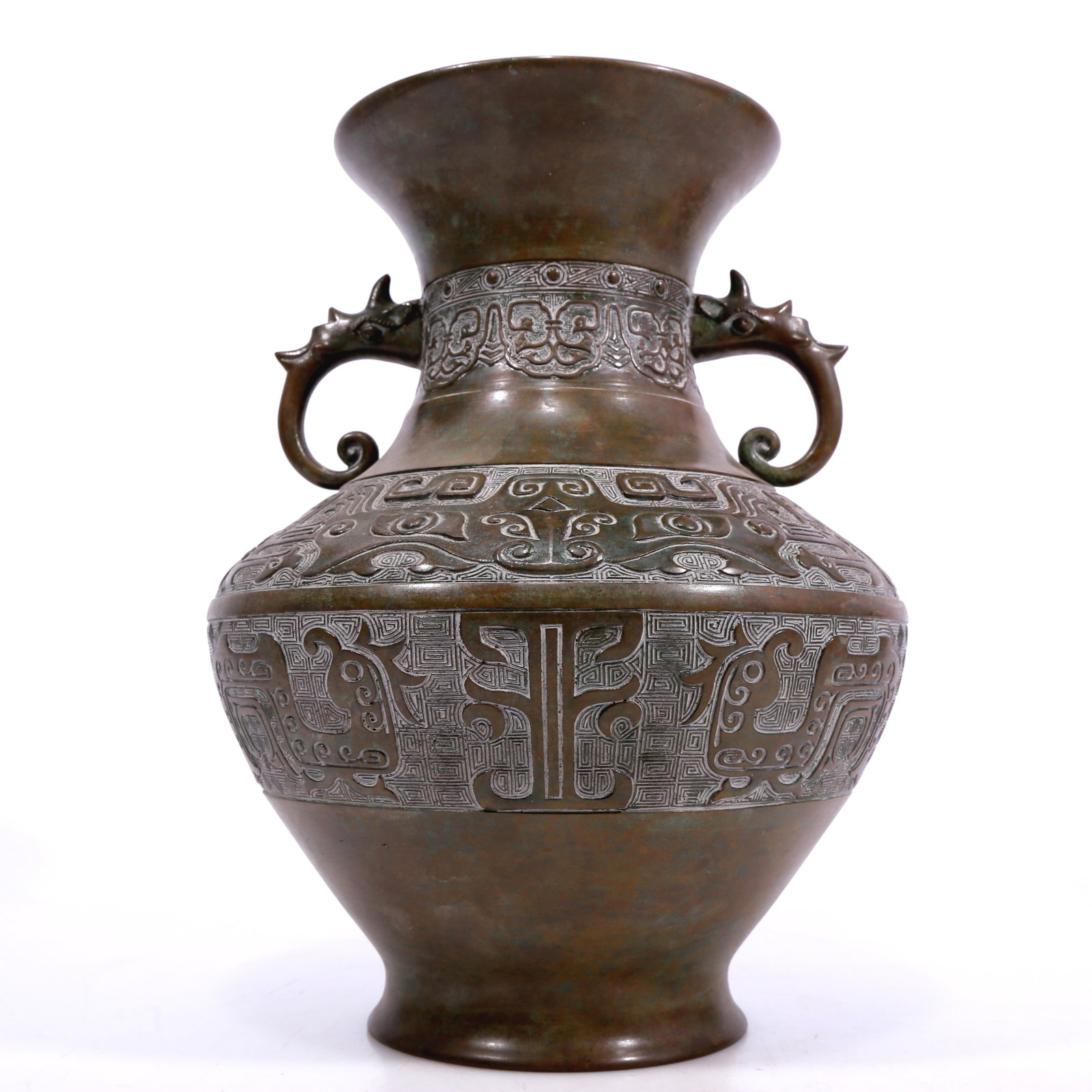 An Excellent Bronze 'Animal Mask' Vase: An Excellent Bronze 'Animal Mask' Vase. Supported on a subtly splayed foot and cast with an everted top, body cast with archaistic motifs. Chinese Qing Dynasty. Marked. Size:8.7inx11.8in. Weight:4335g