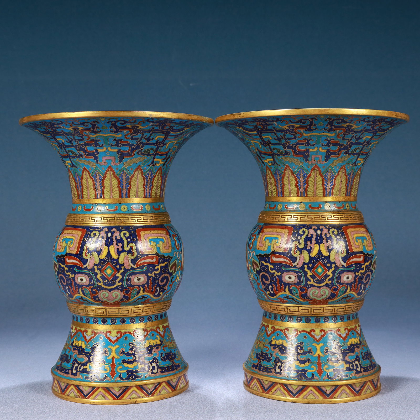 A Pair of Exquisite Cloisonne Beast-Face Pattern Vases: A Pair of Exquisite Cloisonne Beast-Face Pattern Vases,Qing Dynasty, China,Qianlong Four-character Mark,Size:6.5inx9.1in,Weight:3100g