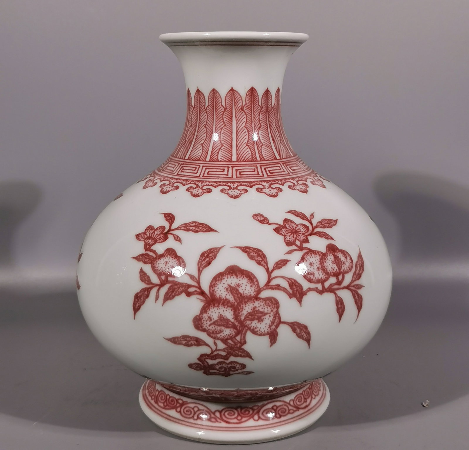An Exquisite Underglaze-Red Fruit Pattern Vase: An Exquisite Underglaze-Red Fruit Pattern Vase,Qing Dynasty, China,Qianlong Six-character Mark,Size:7.7inx3inx6.3in 釉里红果纹瓶,中国清代,&#