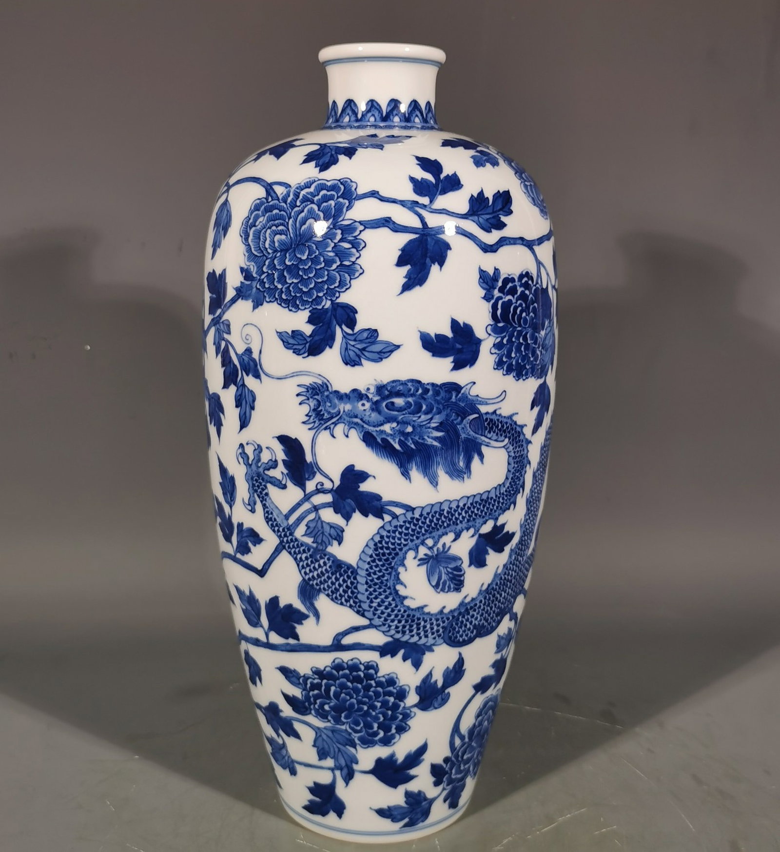 A Rare Blue and White Peony and Dragon Pattern Vase: A Rare Blue and White Peony and Dragon Pattern Vase,Qing Dynasty, China,Qianlong Six-character Mark,Size:13.1inx6.1in 青花牡丹龙纹瓶,中国清&