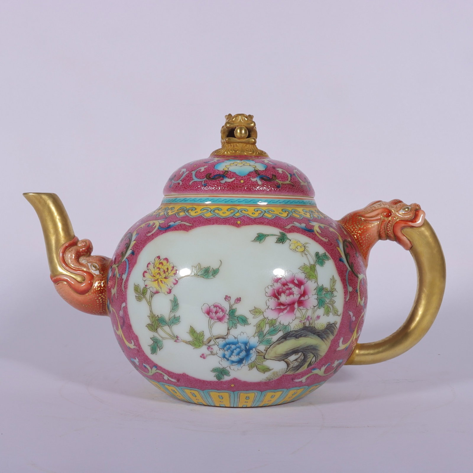 An Exquisite Famille-Rose Ruby Red-Ground Flower Pattern Ewer: An Exquisite Famille-Rose Ruby Red-Ground Flower Pattern Ewer,Qing Dynasty, China,Qianlong Four-character Mark,Size:7.5inx5.9inx3.9inx3.3in 粉彩胭脂红地花