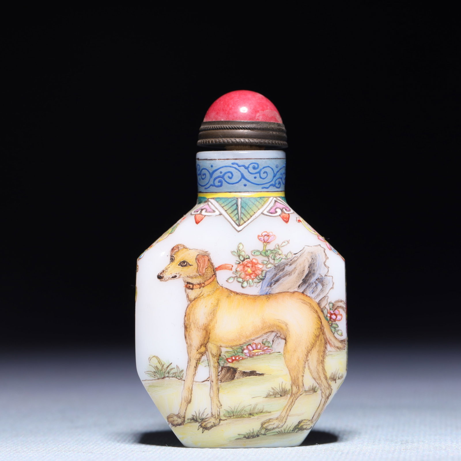 An Exquisite Glass Dog Pattern Snuff Bottle: An Exquisite Glass Dog Pattern Snuff Bottle,Qing Dynasty,China,Qianlong Four-character Mark,Size:1.6inx0.8inx2.8in,Weight:74.6g 琉璃犬纹鼻烟壶,中国